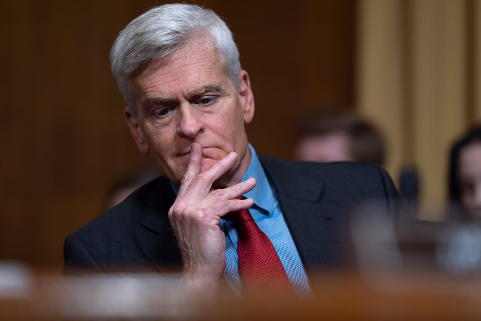 Sen. Bill Cassidy, R-La., keeps his decision until the final moment as the Senate Finance Committee holds a roll call vote to approve the nomination of Robert F. Kennedy Jr. to lead the Health and Human Services Department, at the Capitol in Washington, Tuesday, Feb. 4, 2025. (AP Photo/J. Scott Applewhite)