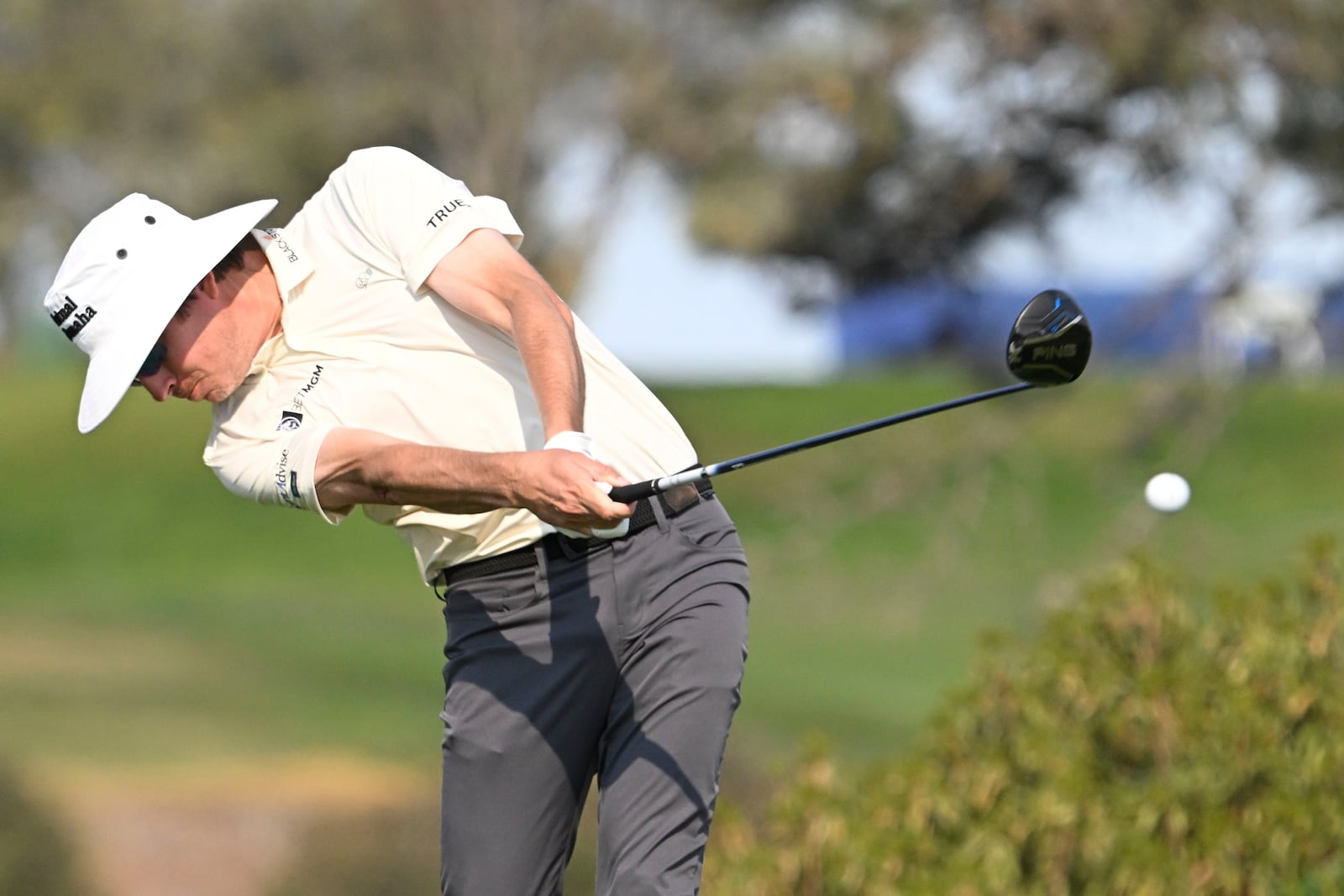 Joel Dahmen hits his tee shot on the fifth hole on the South Course at Torrey Pines during the third round of the Farmers Insurance Open golf tournament Friday, Jan. 24, 2025, in San Diego. (AP Photo/Denis Poroy)