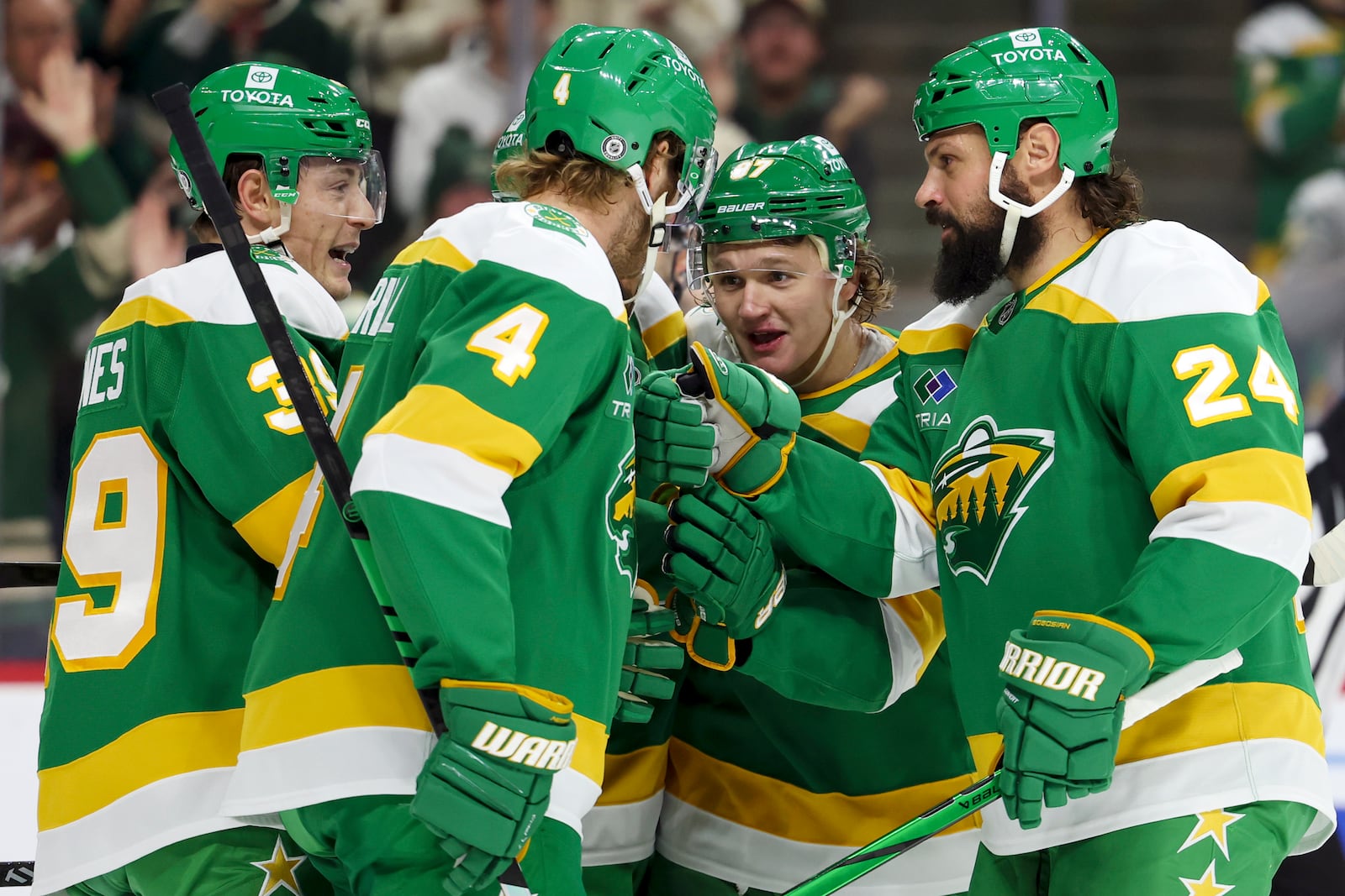 Minnesota Wild left wing Kirill Kaprizov, center right, celebrates his goal with his teammates during the first period of an NHL hockey game against the Philadelphia Flyers, Saturday, Dec. 14, 2024, in St. Paul, Minn. (AP Photo/Ellen Schmidt)