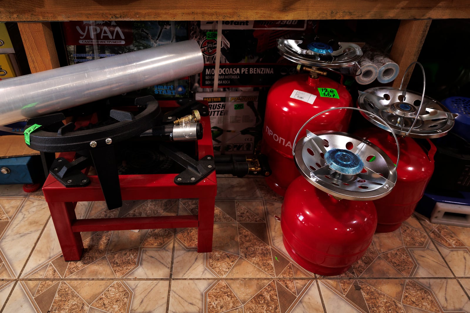 Camping gas canisters on display in a village shop in Copanca, Moldova, Wednesday, Jan. 8, 2025. (AP Photo)