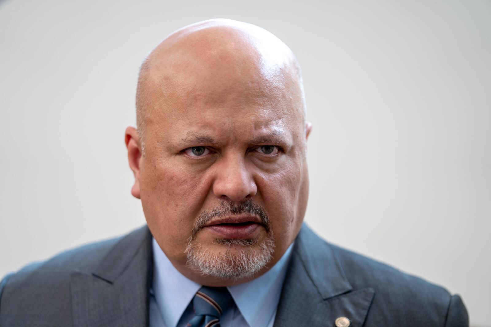 FILE - Karim Khan, prosecutor of the International Criminal Court, looks up prior to a press conference in The Hague, Netherlands, July 3, 2023. (AP Photo/Peter Dejong, File)