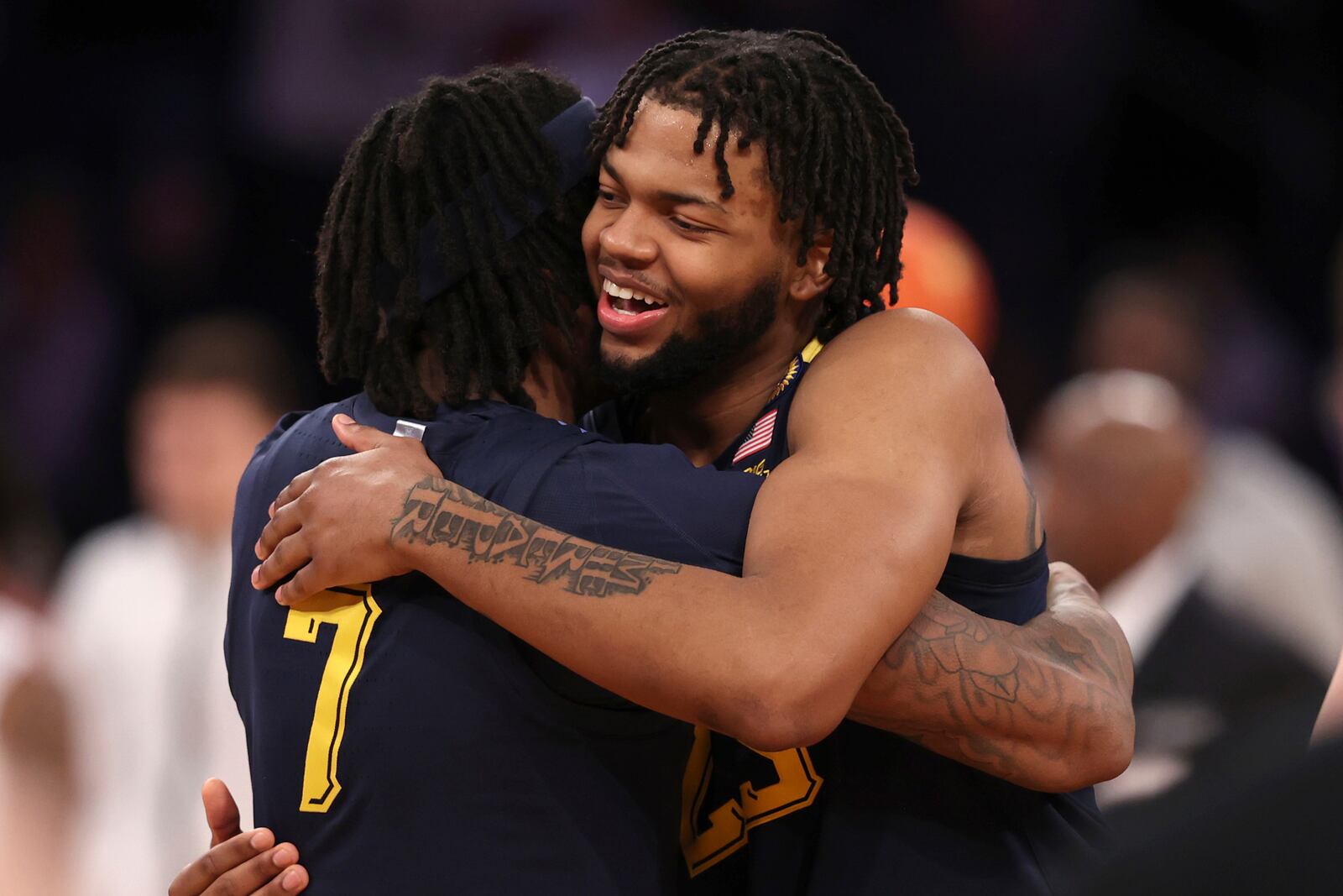 Marquette forward David Joplin, right, and guard Zaide Lowery (7), left, hug after defeating Xavier in an NCAA college basketball game in the quarterfinals of the Big East Conference tournament, Thursday, March 13, 2025, in New York. (AP Photo/Pamela Smith)