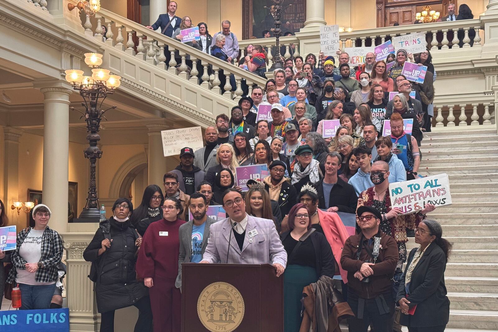 Transgender activists speak at the Georgia Capitol on Jan. 13, 2025 in Atlanta. (AP Photo/Charlotte Kramon)