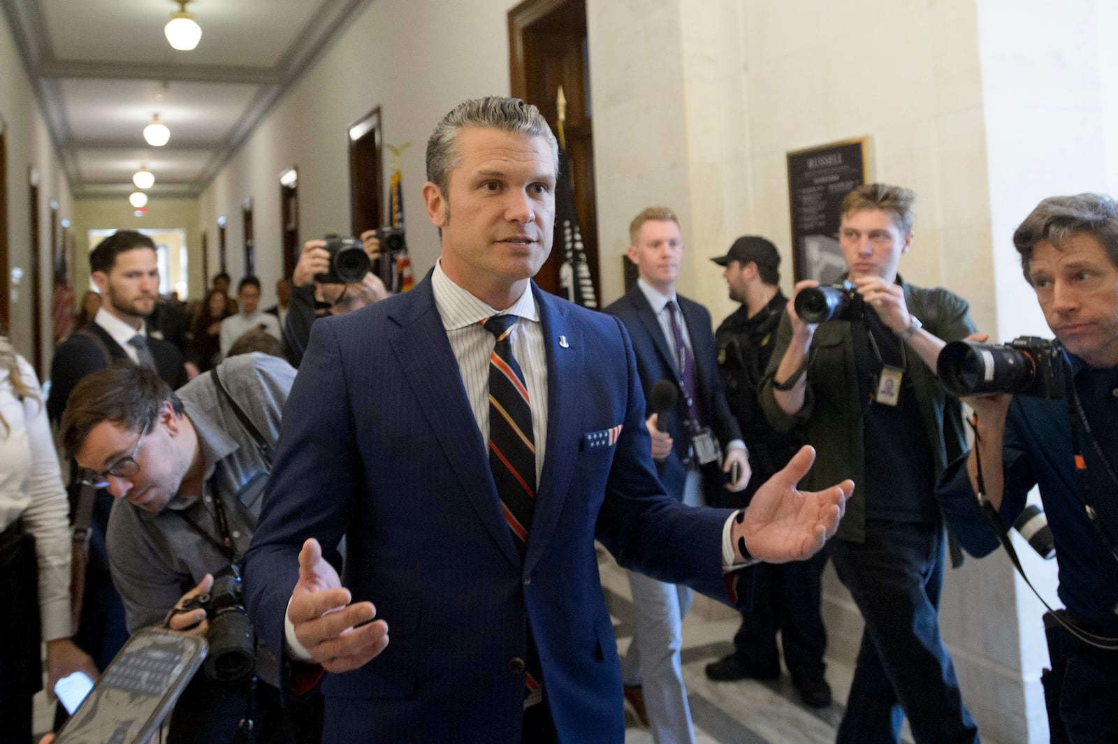 Pete Hegseth, President-elect Donald Trump's pick for secretary of defense, speaks with reporters following a meeting with senators on Capitol Hill, Thursday, Nov. 21, 2024, in Washington. (AP Photo/Rod Lamkey, Jr.)