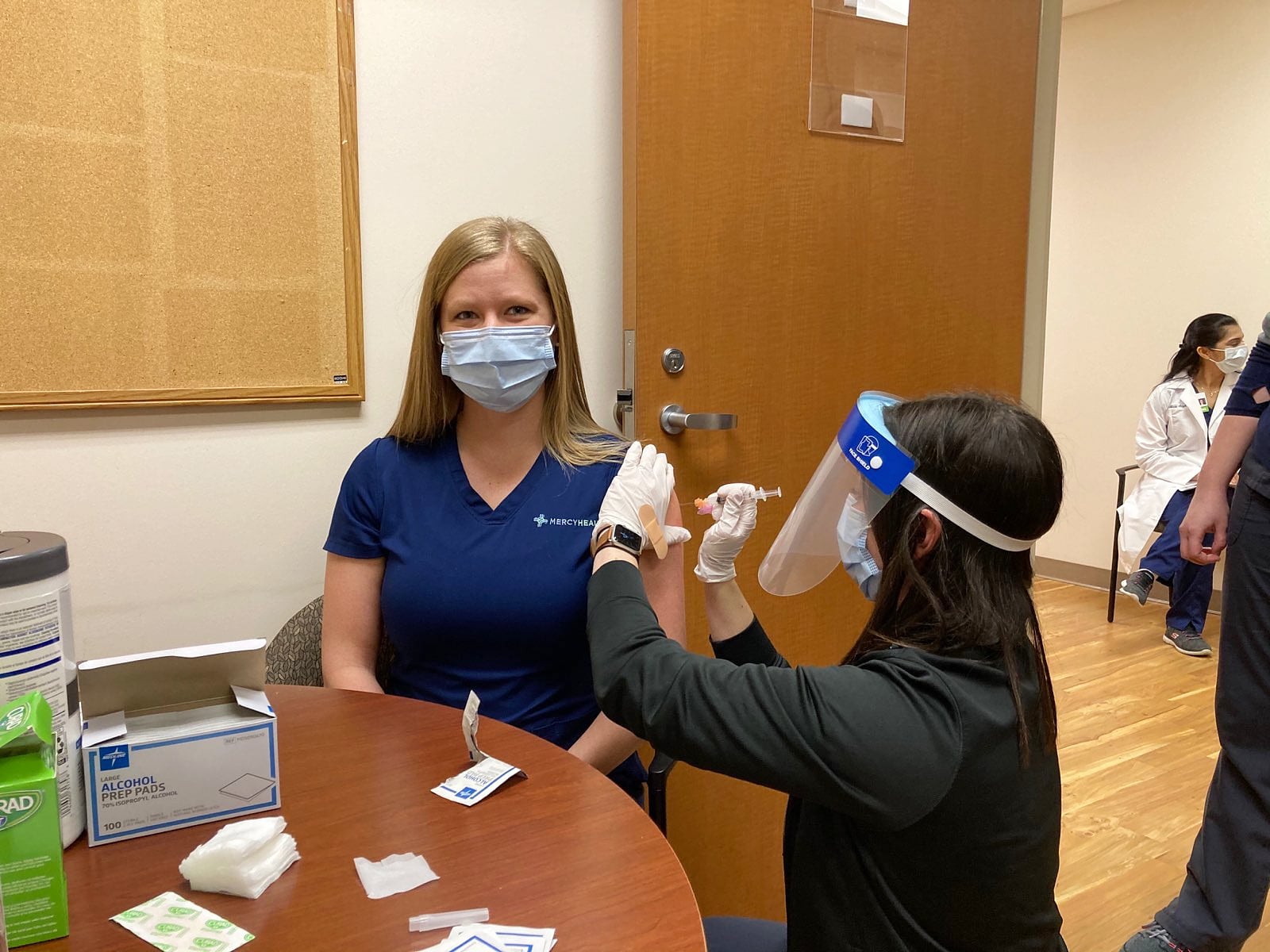 Mercy Health-Fairfield Hospital nurse Julie Rose, a COVID-floor nurse, receives the Moderna COVID-19 vaccine shot on Wednesday, Dec. 23, 2020. Mercy Health received its vaccine allotment on Wednesday, Dec. 23, 2020. PROVIDE/MERCY HEALTH