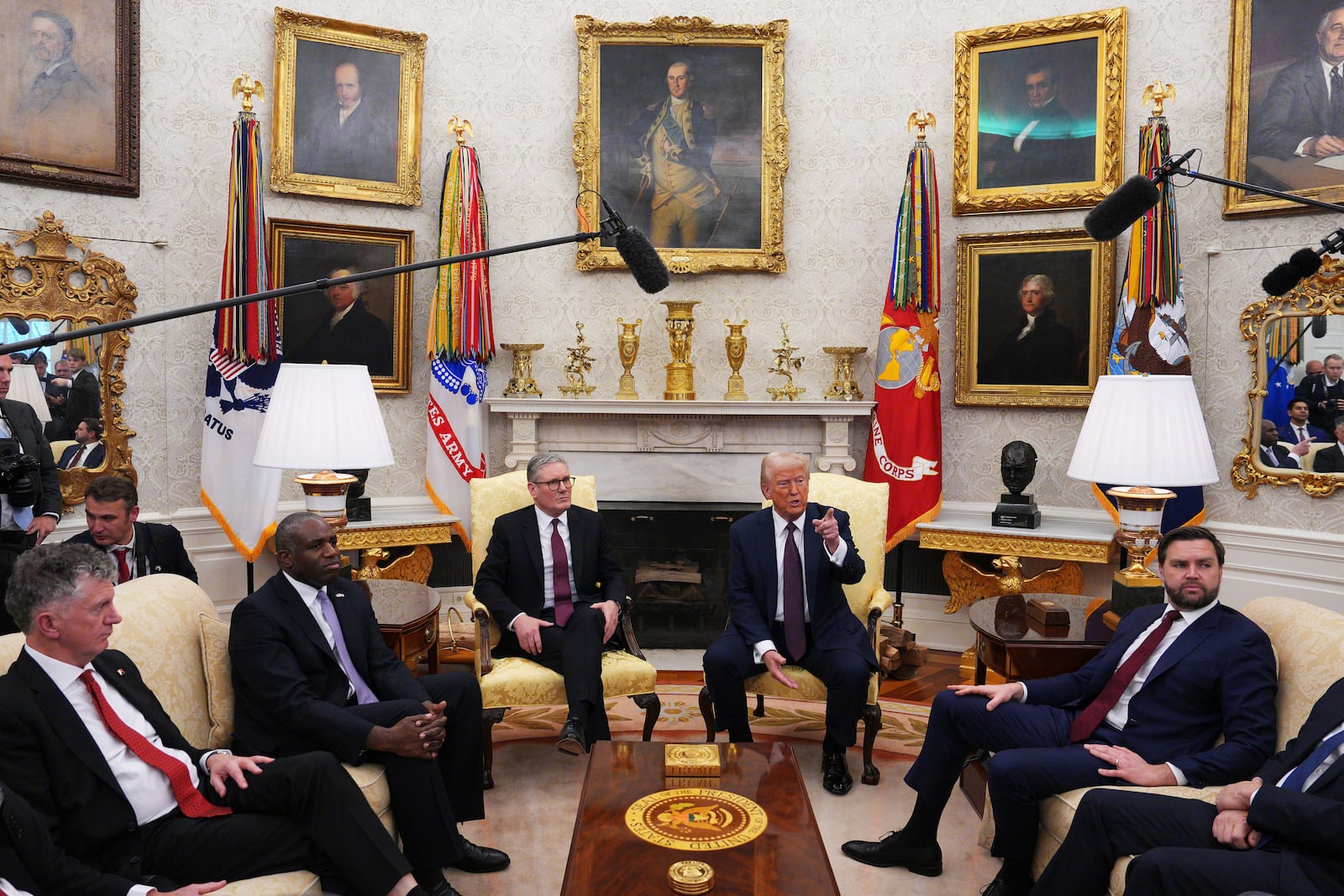 President Donald Trump meets with British Prime Minister Keir Starmer, center left, alongside U.S. Vice President JD Vance, right, and British Foreign Secretary David Lammy, 2nd left, at the White House, Thursday, Feb. 27, 2025, in Washington. (Carl Court/Pool via AP)