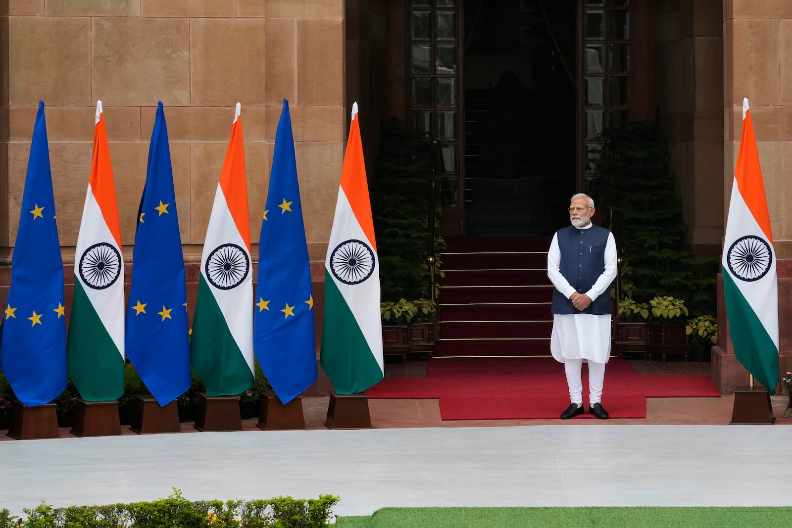 Indian Prime Minister Narendra Modi waits to receive European Commission President Ursula von der Leyen for their meeting in New Delhi, India, Friday, Feb. 28, 2025. (AP Photo/Manish Swarup)