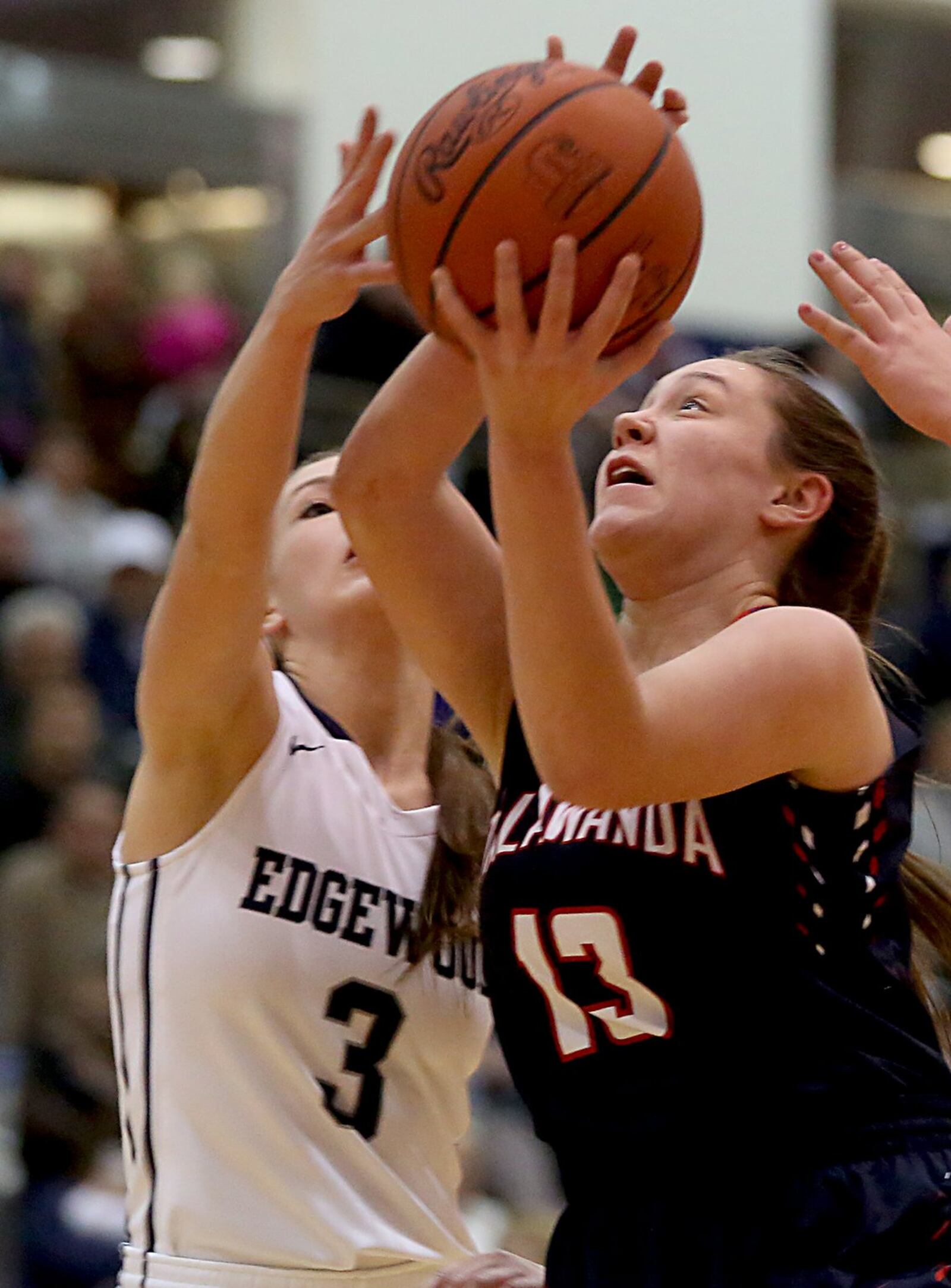 Talawanda guard Gabby Lindley scores against Edgewood guard Tori Childers on Wednesday night at Ron Kash Court in Trenton. CONTRIBUTED PHOTO BY E.L. HUBBARD