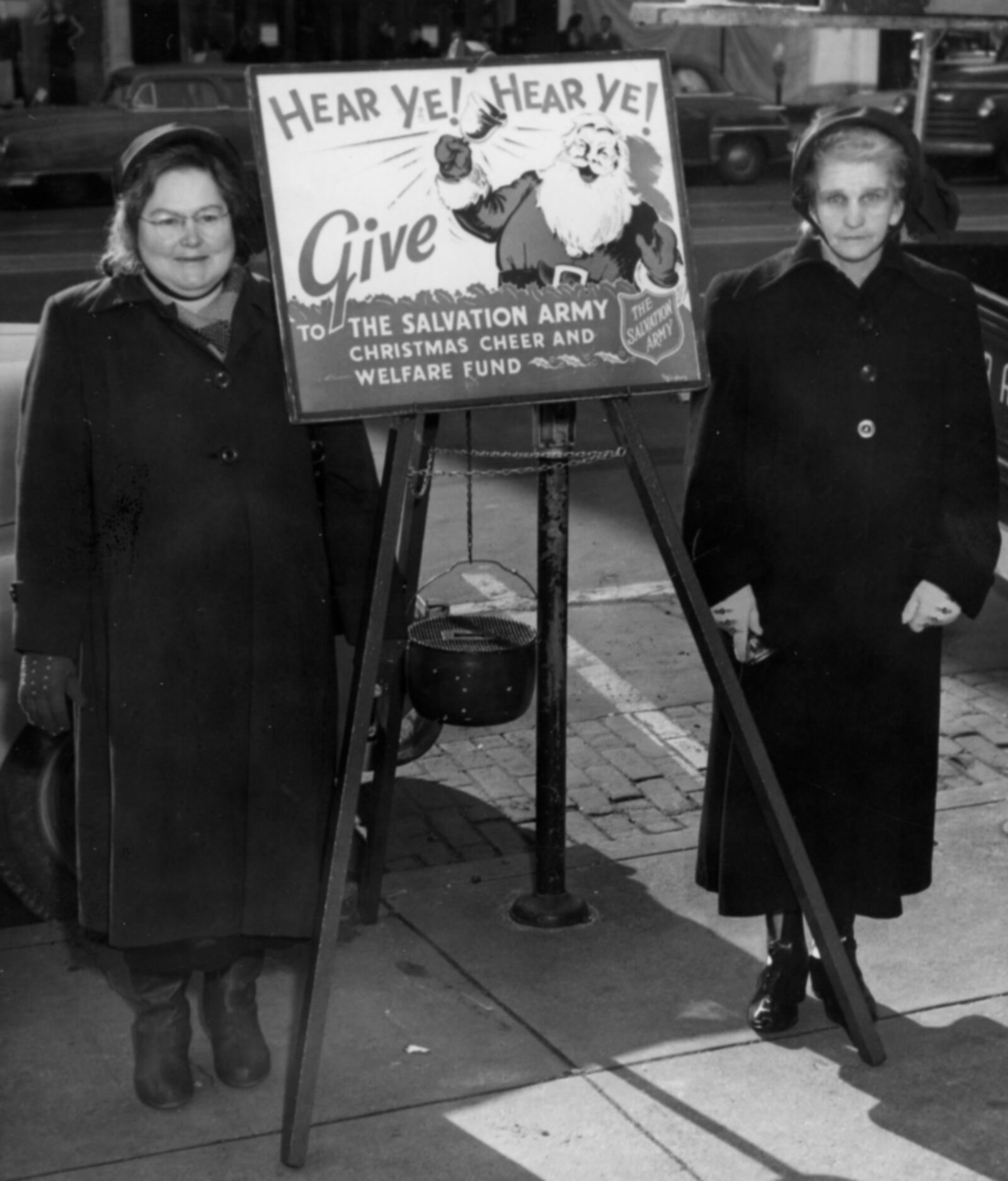 Two unidentified Salvation Army “Lassies” tend to their red kettle during the December 1950 fund drive. BUTLER COUNTY HISTORICAL SOCIETY/CONTRIBUTED