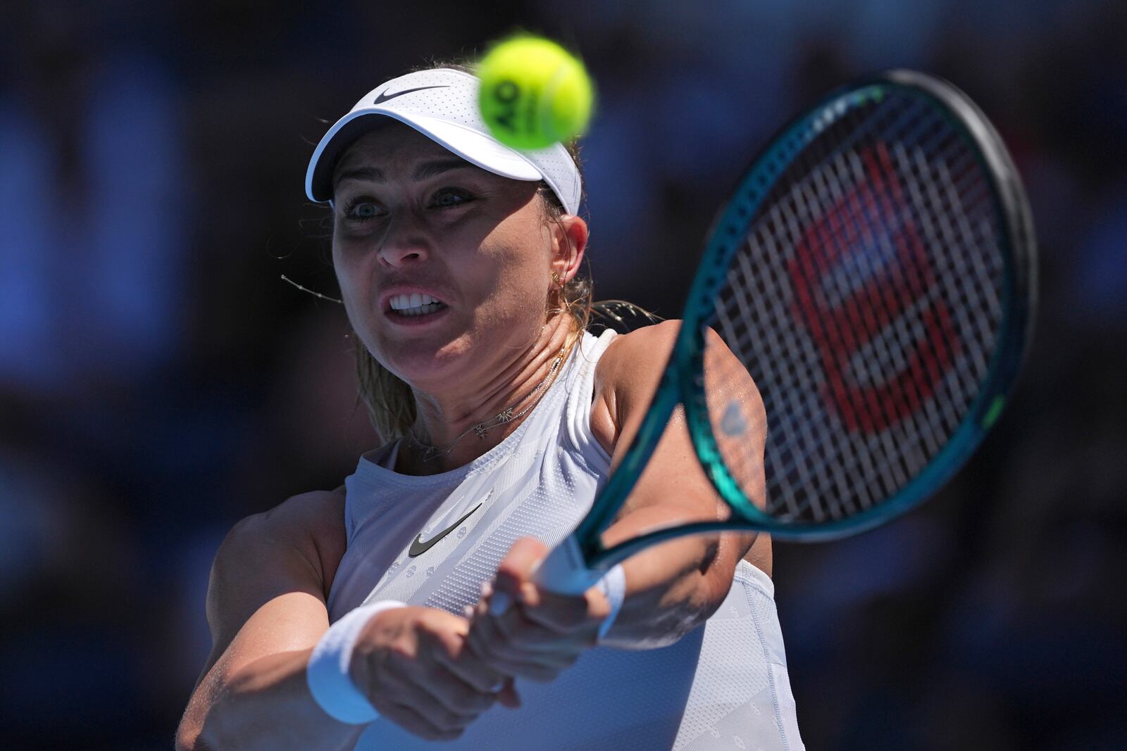 Paula Badosa of Spain plays a backhand return to Coco Gauff of the U.S. during their quarterfinal match at the Australian Open tennis championship in Melbourne, Australia, Tuesday, Jan. 21, 2025. (AP Photo/Ng Han Guan)