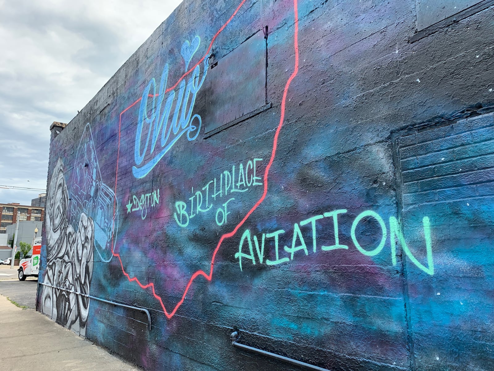 Dayton native Charles Bassett II is a central figure on the Dayton  space mural in downtown Dayton. He died during a NASA accident in 1966.