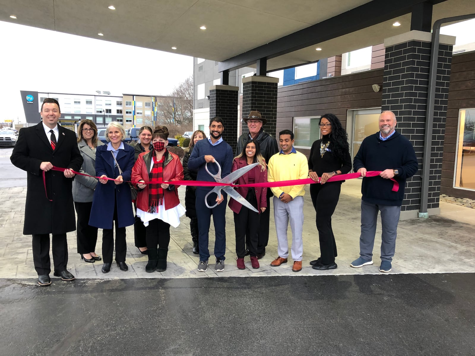 Representatives from Scarlet and Gray Hospitality, Chamber of Commerce serving Middletown, Monroe and Trenton and city officials attended a ribbon-cutting at the Holiday Inn Express and Suites, 120 Senate Drive, Monroe. RICK McCRABB/STAFF