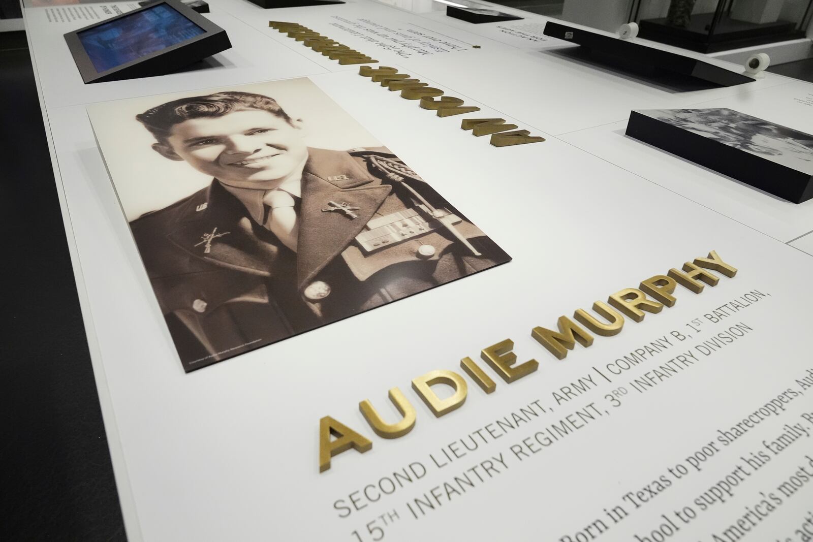 An image of Medal of Honor recipient Audie Murphy is on display at the National Medal of Honor Museum in Arlington, Texas, Thursday, March 13, 2025. (AP Photo/Tony Gutierrez)