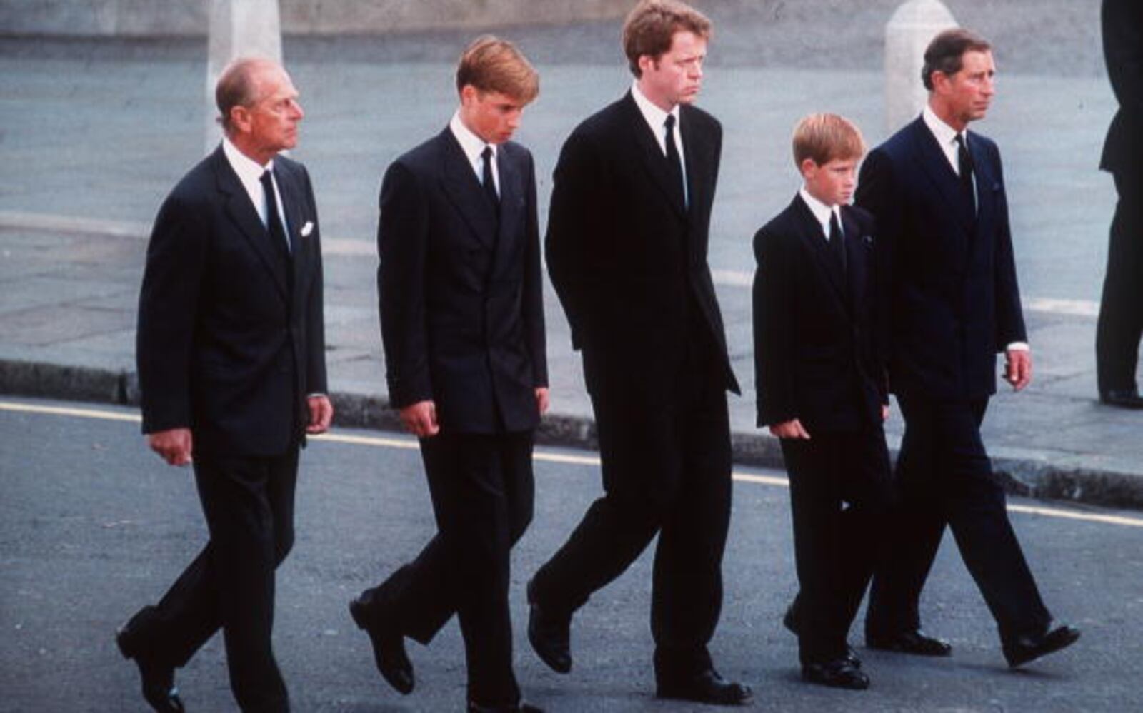 LONDON, ENGLAND - SPETEMBER 6:  (FILE PHOTO) Prince Philip, the Duke of Edinburgh, Prince William, Earl Spencer, Prince Harry and Prince Charles, the Prince of Wales follow the coffin of Diana, Princess of Wales this in September 6, 1997 file photo in London, England.  The funeral took place seven days after she was killed in an automobile accident in Paris. Members of the royal family walked in the procession behind the coffin, as did 500 representatives of the charities associated with the Princess.  At least a million people lined the streets of central London to watch the procession from Kensington Palace to Westminster Abbey.   (Photo by Anwar Hussein/Getty Images)