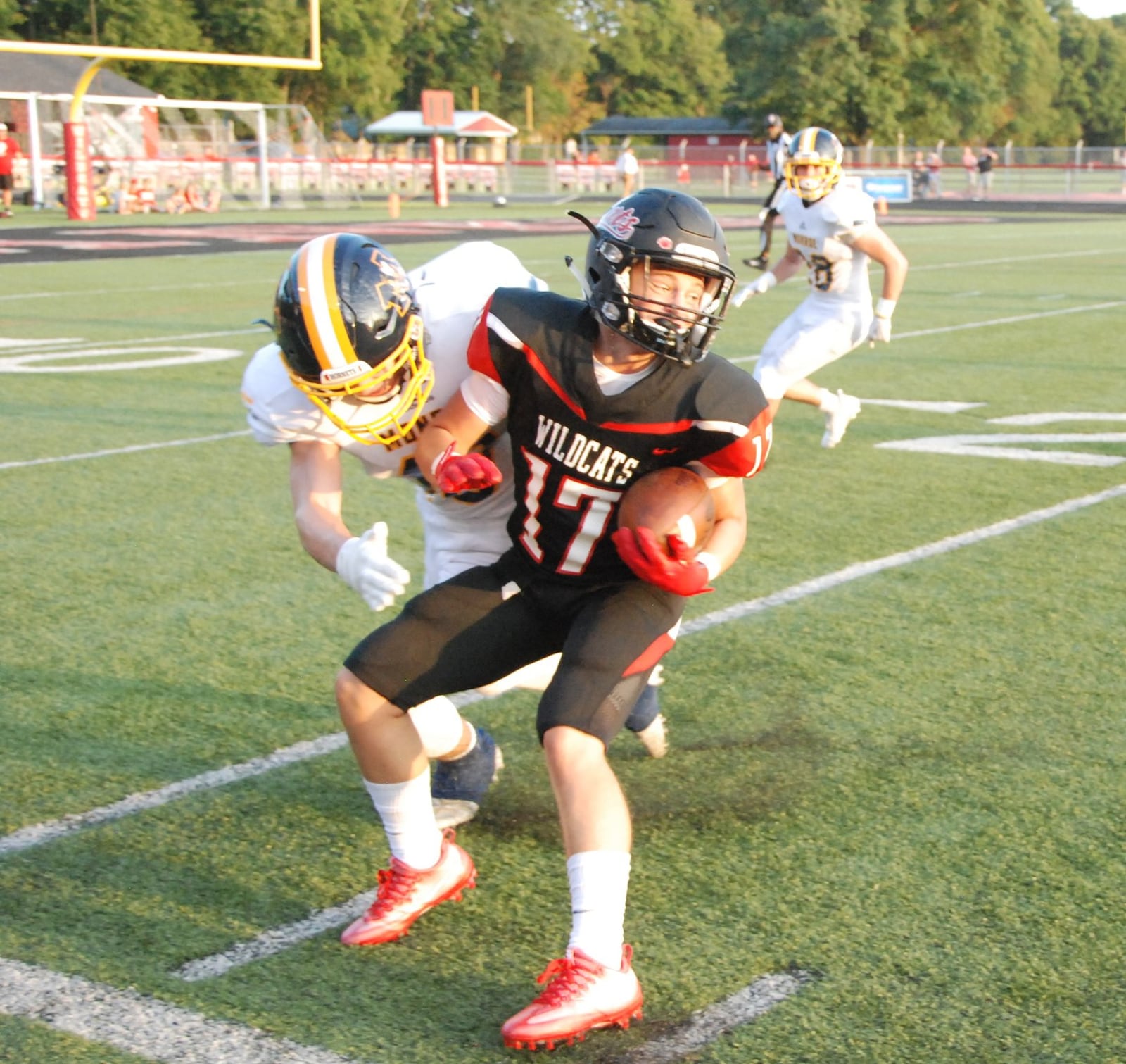 Franklin’s Champ Howard (17) is about to make a spin move on a Monroe defender during a 24-3 win for the home team Friday night at Atrium Stadium in Franklin. CONTRIBUTED PHOTO BY OLIVER SANDERS