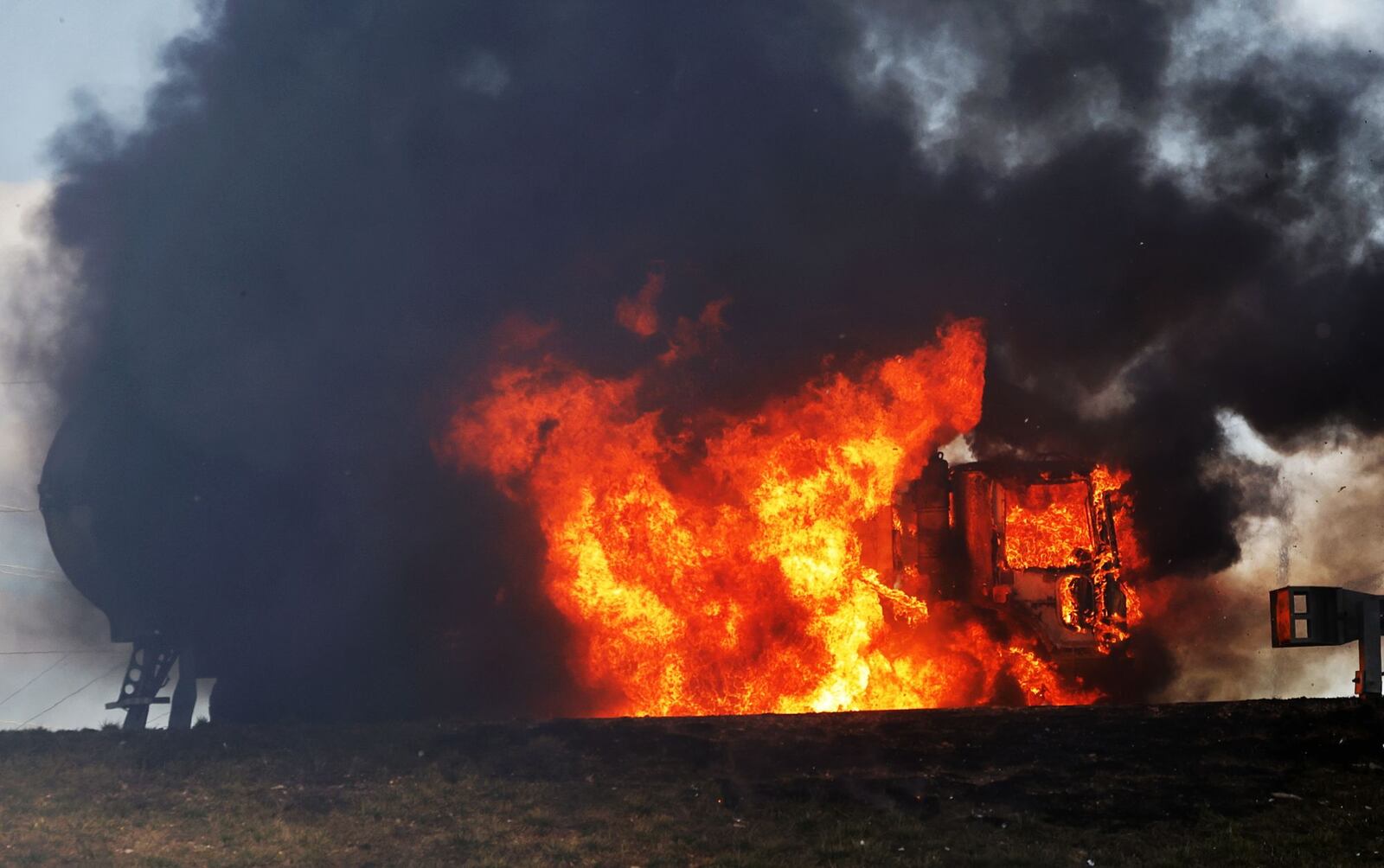 A Rumpke truck caught fire on Grand Boulevard in Hamilton on Tuesday, March 7, 2023. NICK GRAHAM/STAFF