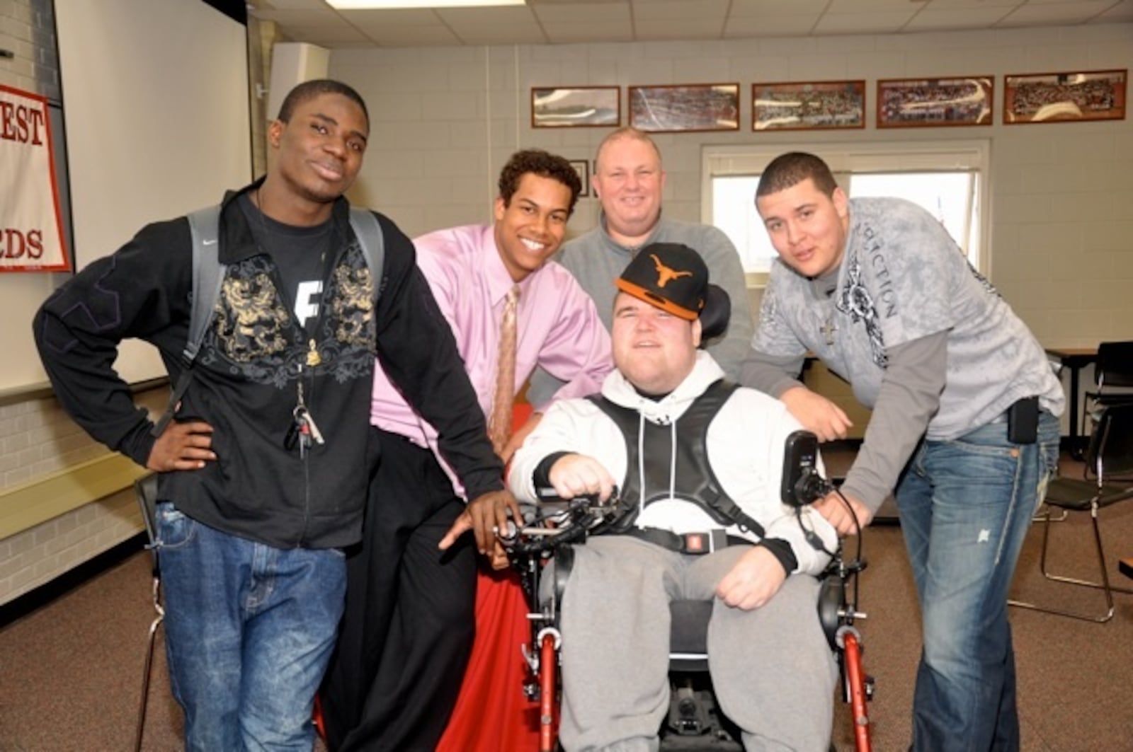 Jordan Hicks (pink shirt) with his late friend Greg Osinski (center) and Darren Walters (back center) and two other friends during Hicks' high school days at Lakota West. CONTRIBUTED