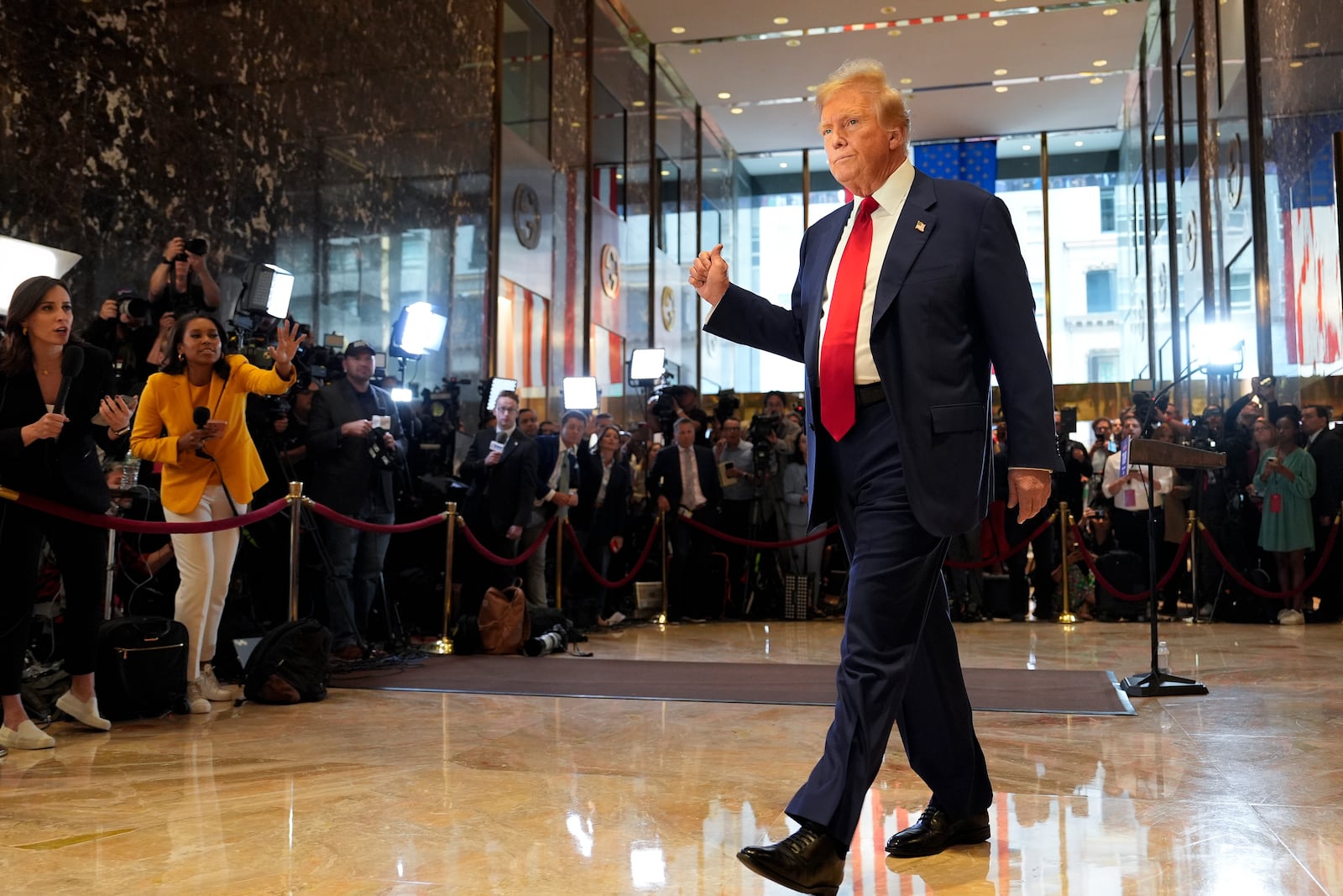 FILE - Former President Donald Trump gestures as he leaves after speaking at a news conference at Trump Tower, Friday, May 31, 2024, in New York. (AP Photo/Julia Nikhinson, File)