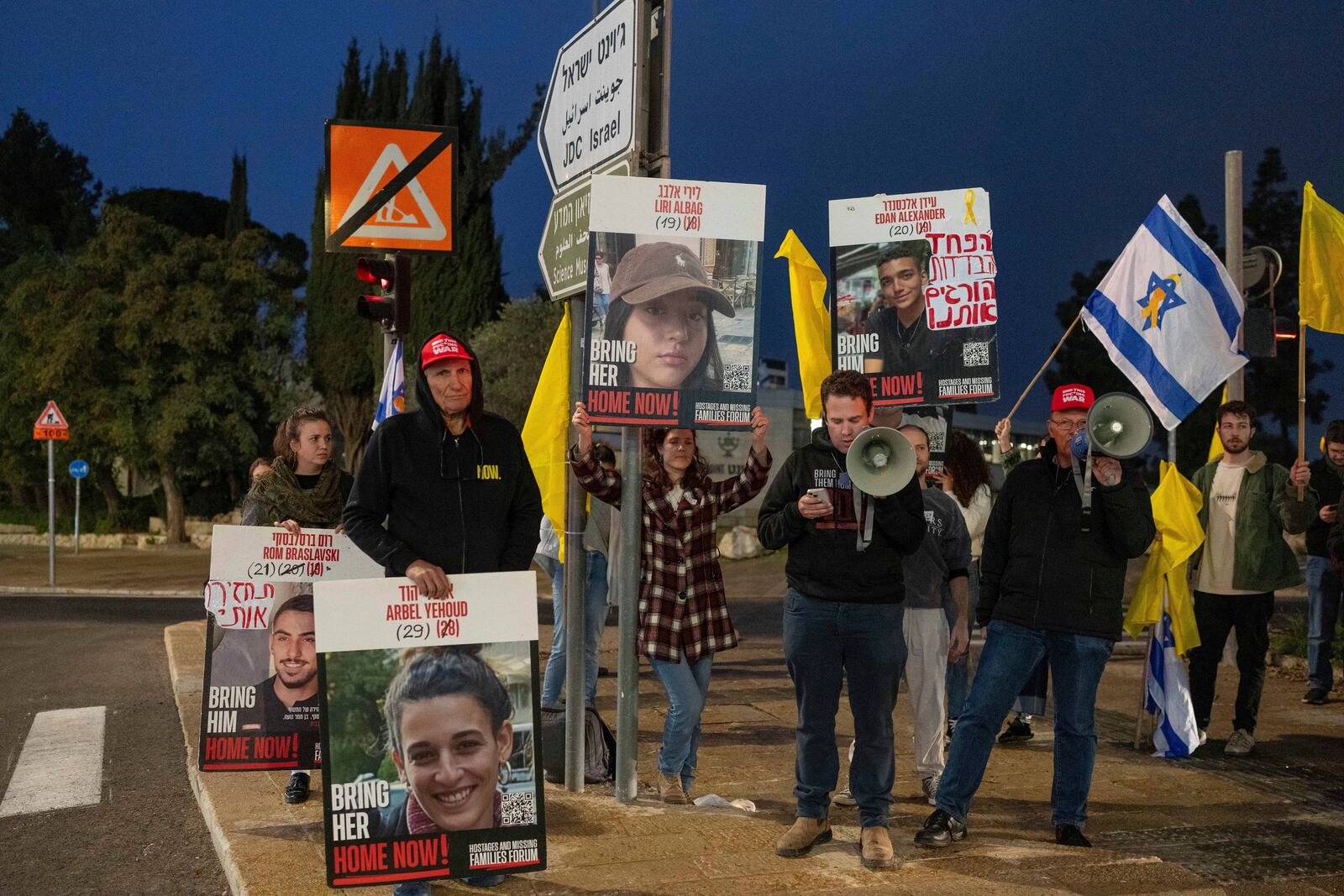 FILE - Israelis seeking the release of hostages in the Gaza Strip demonstrate outside the prime minister's office in Jerusalem on Jan. 5, 2025 (AP Photo/Ohad Zwigenberg, File)