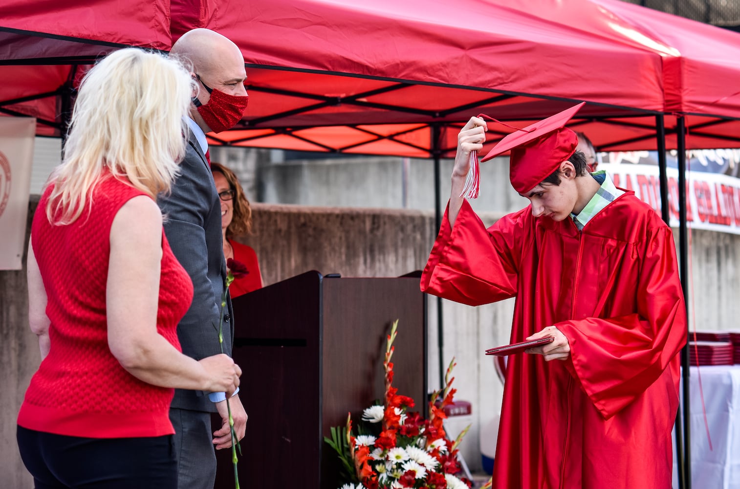 Madison High School drive-thru graduation ceremony at Land of Illusion