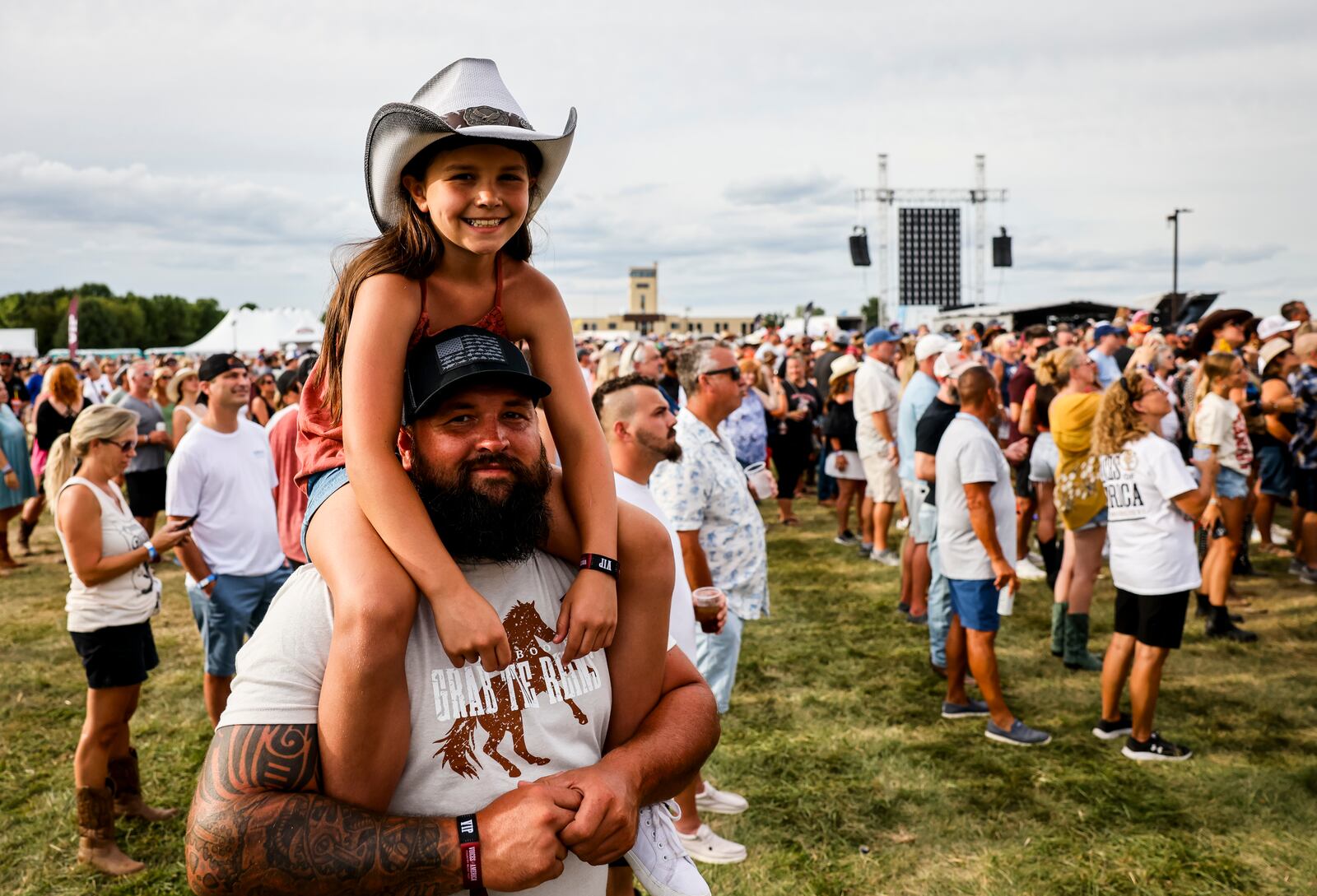 Thousands of fans gather on day four of the first Voices of America Country Music Fest Sunday, Aug. 13, 2023 on the grounds of National Voice of America Museum of Broadcasting in West Chester Township. NICK GRAHAM/STAFF