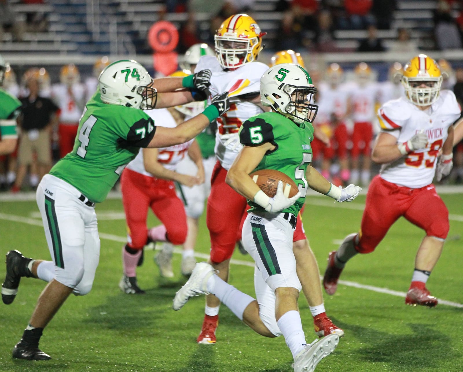 Marshal Flaig of Badin turns the corner. Badin defeated visiting Fenwick 34-6 in a Week 8 high school football game at Virgil Schwarm Stadium on Friday, Oct. 18, 2019. MARC PENDLETON / STAFF