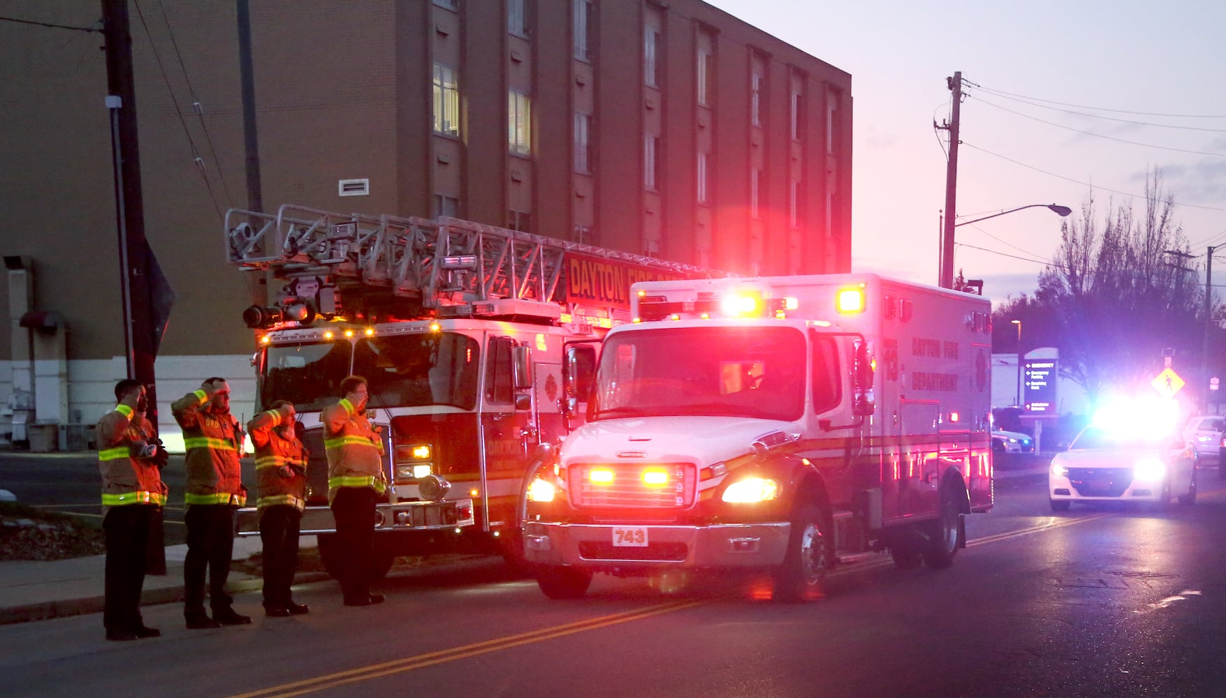 PHOTOS: People line street for fallen Dayton detective’s processional