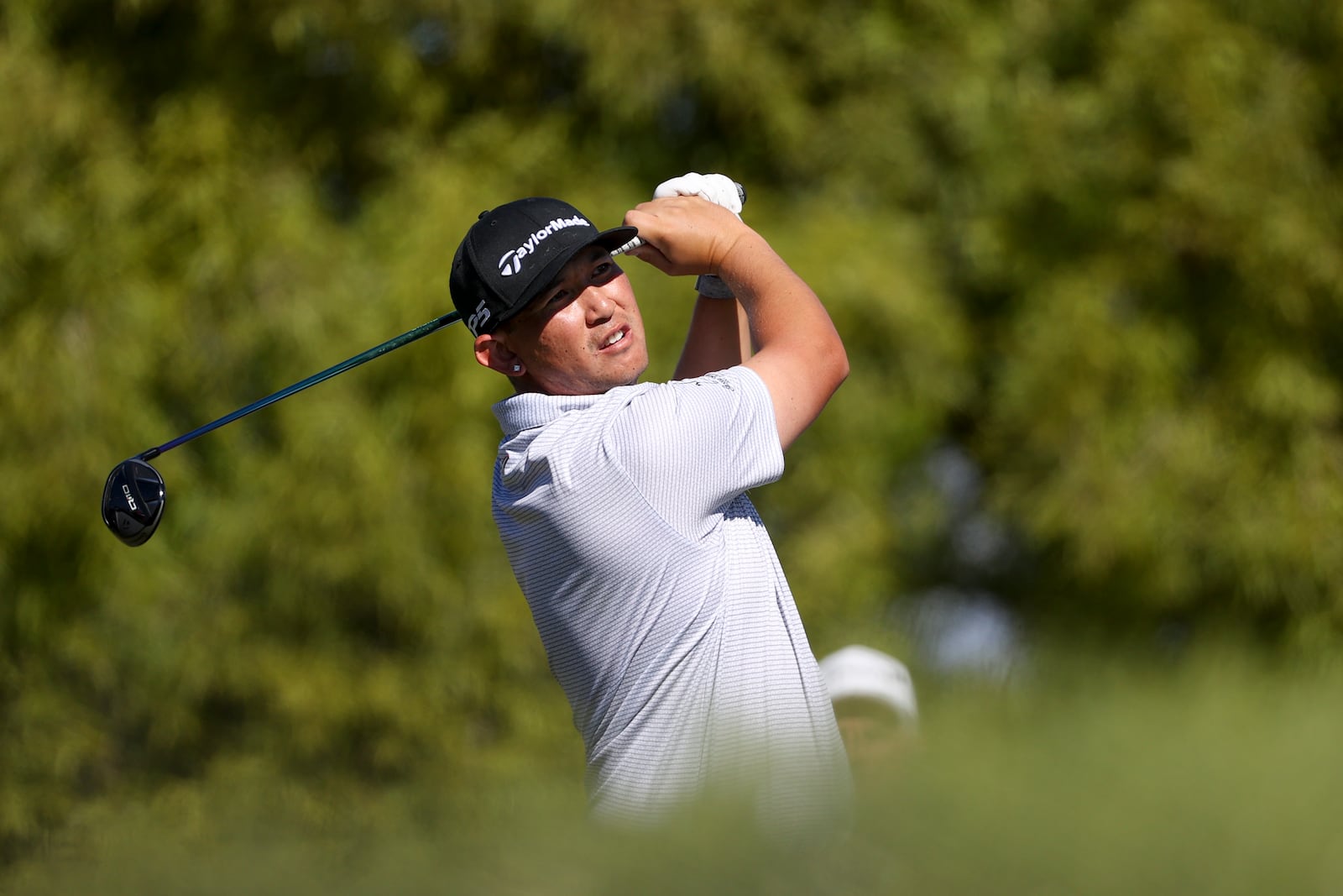 Rico Hoey hits off the first tee during the final round of the Shriners Children's Open golf tournament, Sunday, Oct. 20, 2024, in Las Vegas. (AP Photo/Ian Maule)