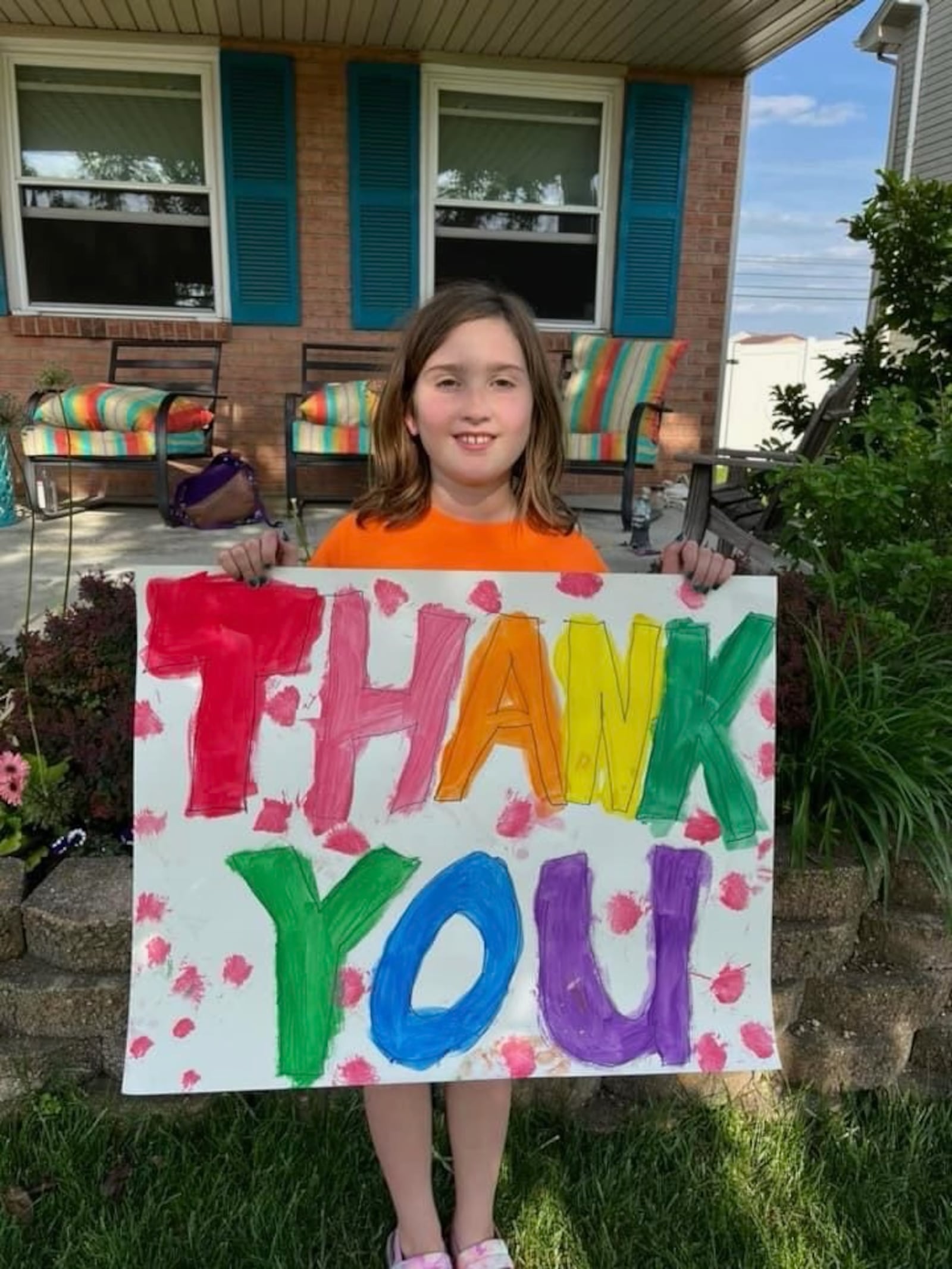 Lilian Moore, 11, of Trenton, generated more than $6,000 by selling popsicles and water during the city’s annual garage sale. CONTRIBUTED