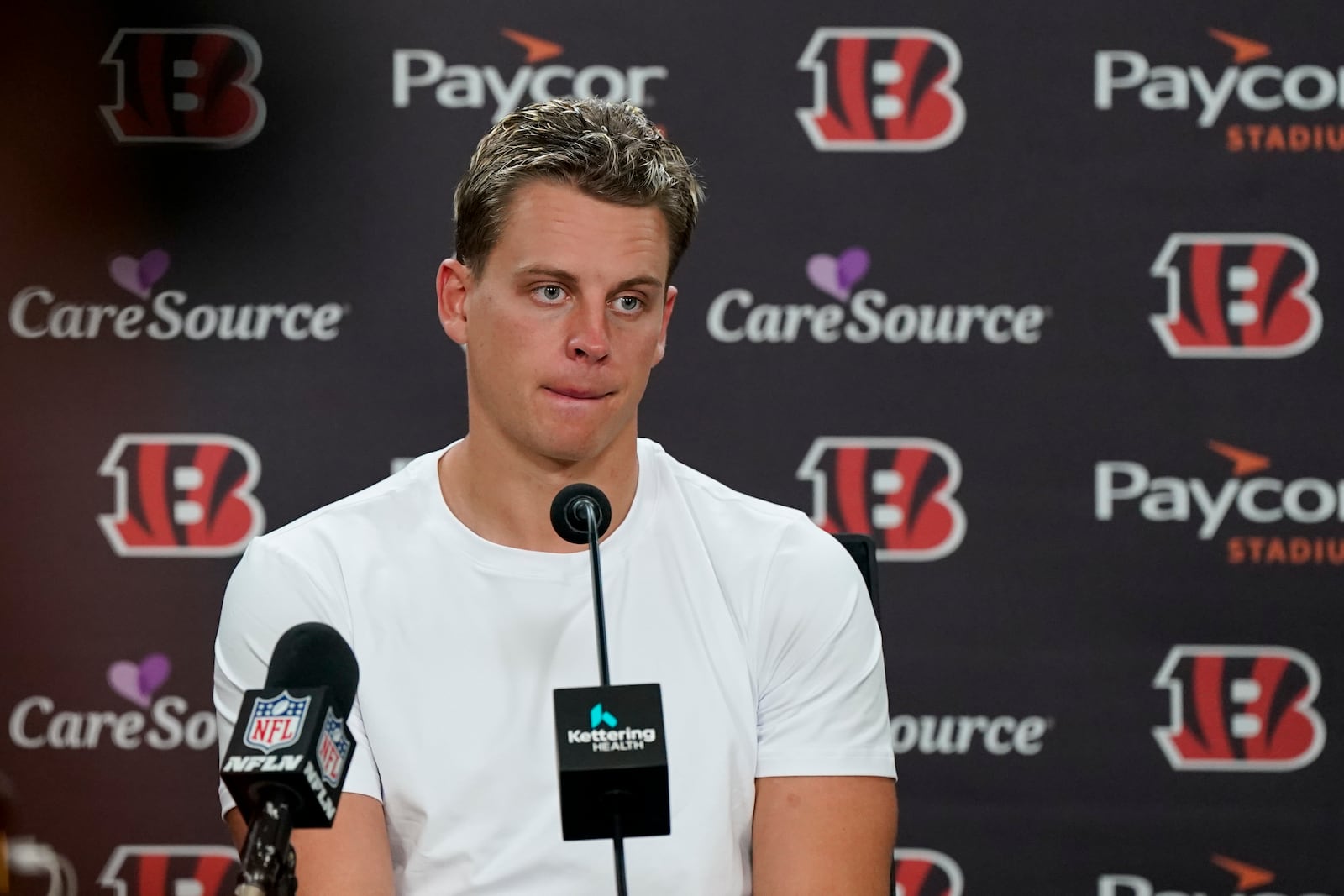 Cincinnati Bengals quarterback Joe Burrow talks to reporters following an NFL football game against the Philadelphia Eagles, Sunday, Oct. 27, 2024, in Cincinnati. The Eagles won 37-17. (AP Photo/Jeff Dean)