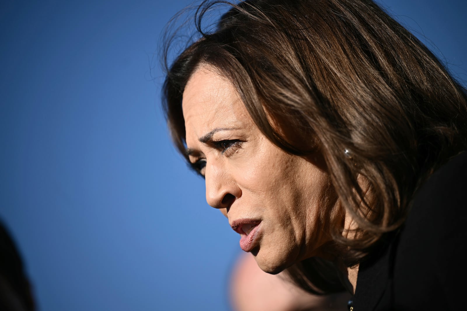 Democratic presidential nominee Vice President Kamala Harris talks to reporters before boarding Air Force Two, Wednesday, Oct. 30, 2024, at Joint Base Andrews, Md. (Brendan Smialowski/Pool via AP)