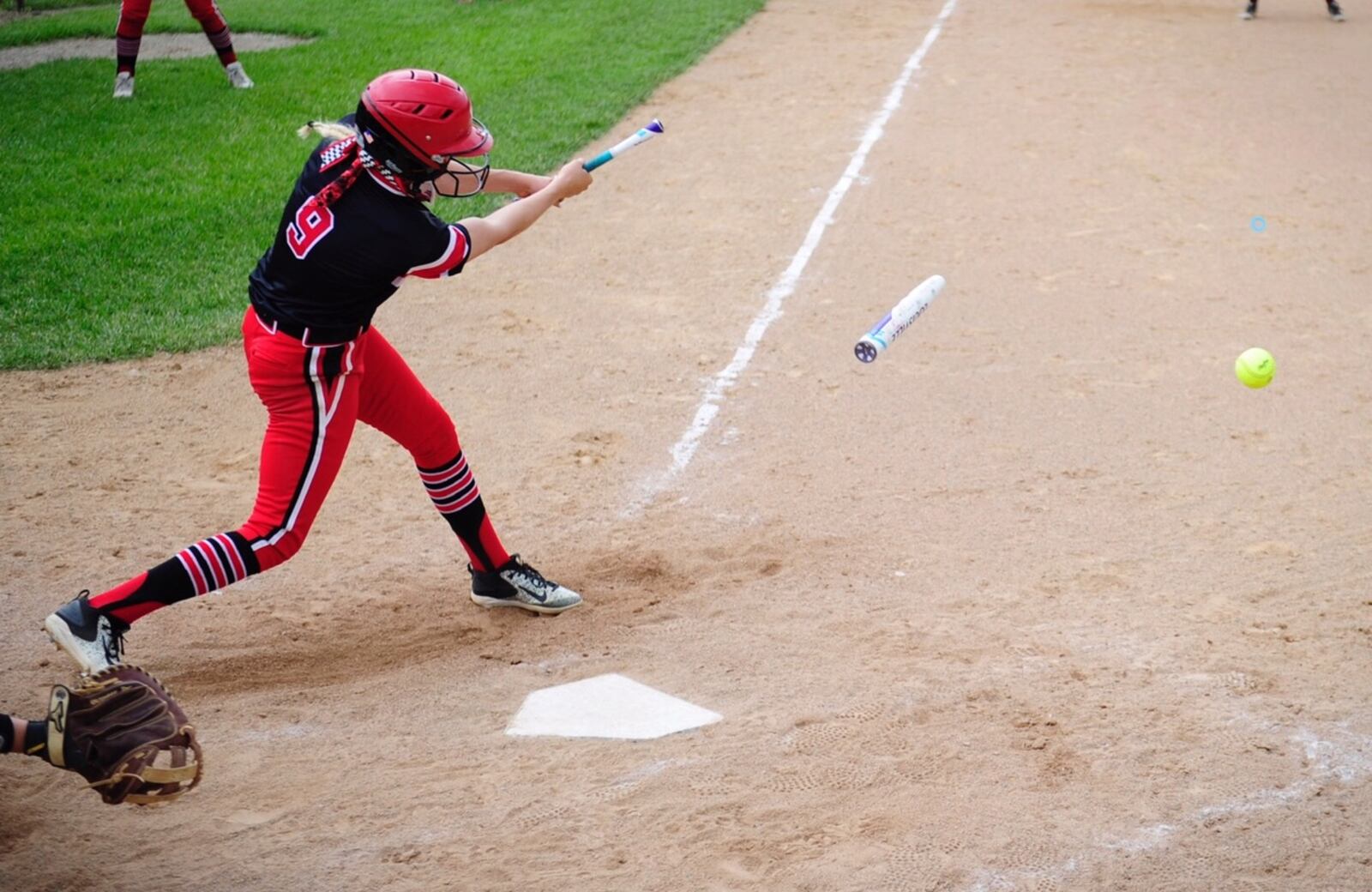 The bat of Lakota West's Alyssa Triner breaks in half during an at-bat in Wednesday's game vs. Lebanon. NICK GRAHAM/STAFF