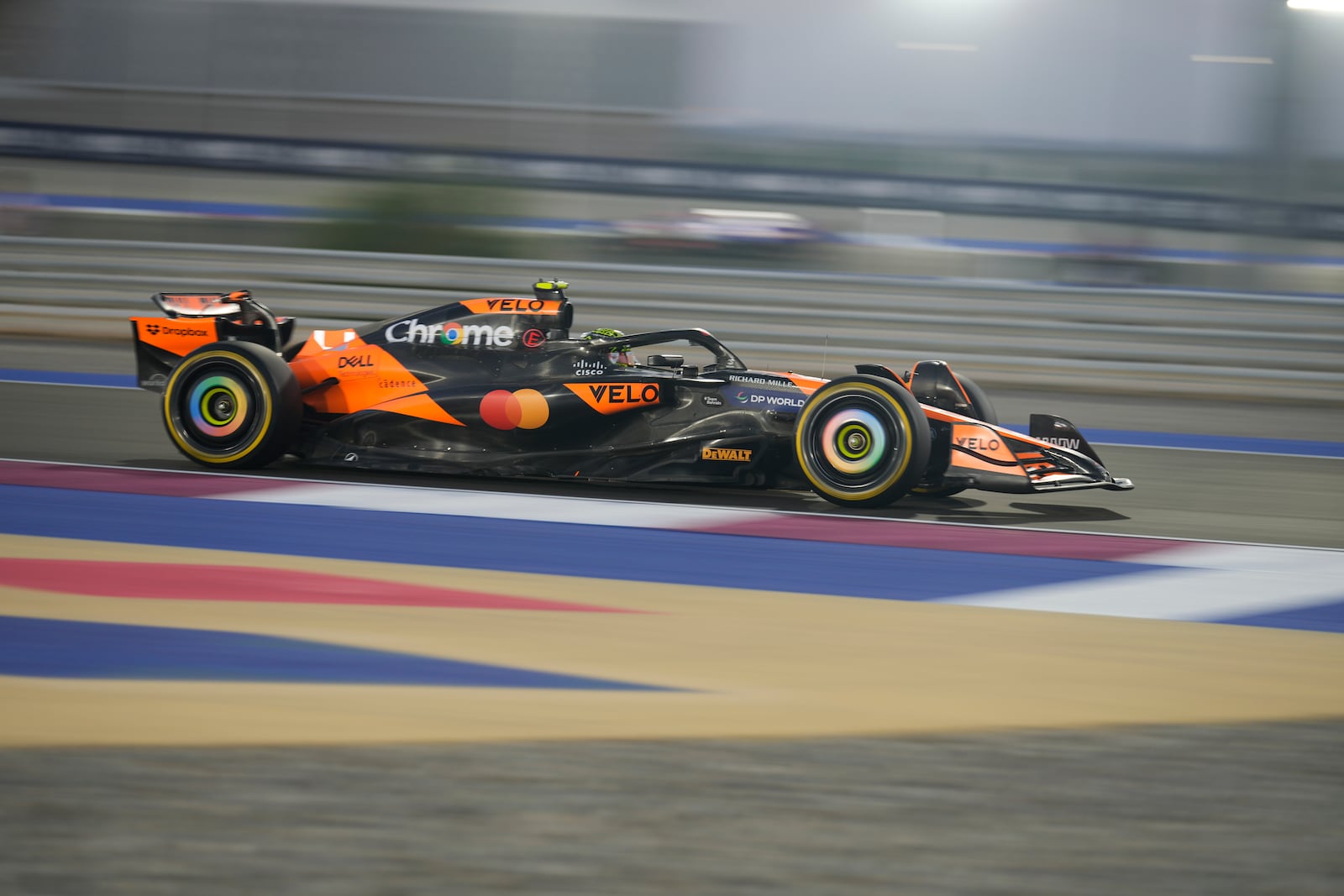 McLaren driver Lando Norris of Britain in action during practice at the Lusail International Circit in Lusail, Qatar, ahead of the Qatar Formula One Grand Prix, Friday, Nov. 29, 2024. (AP Photo/Altaf Qadri)