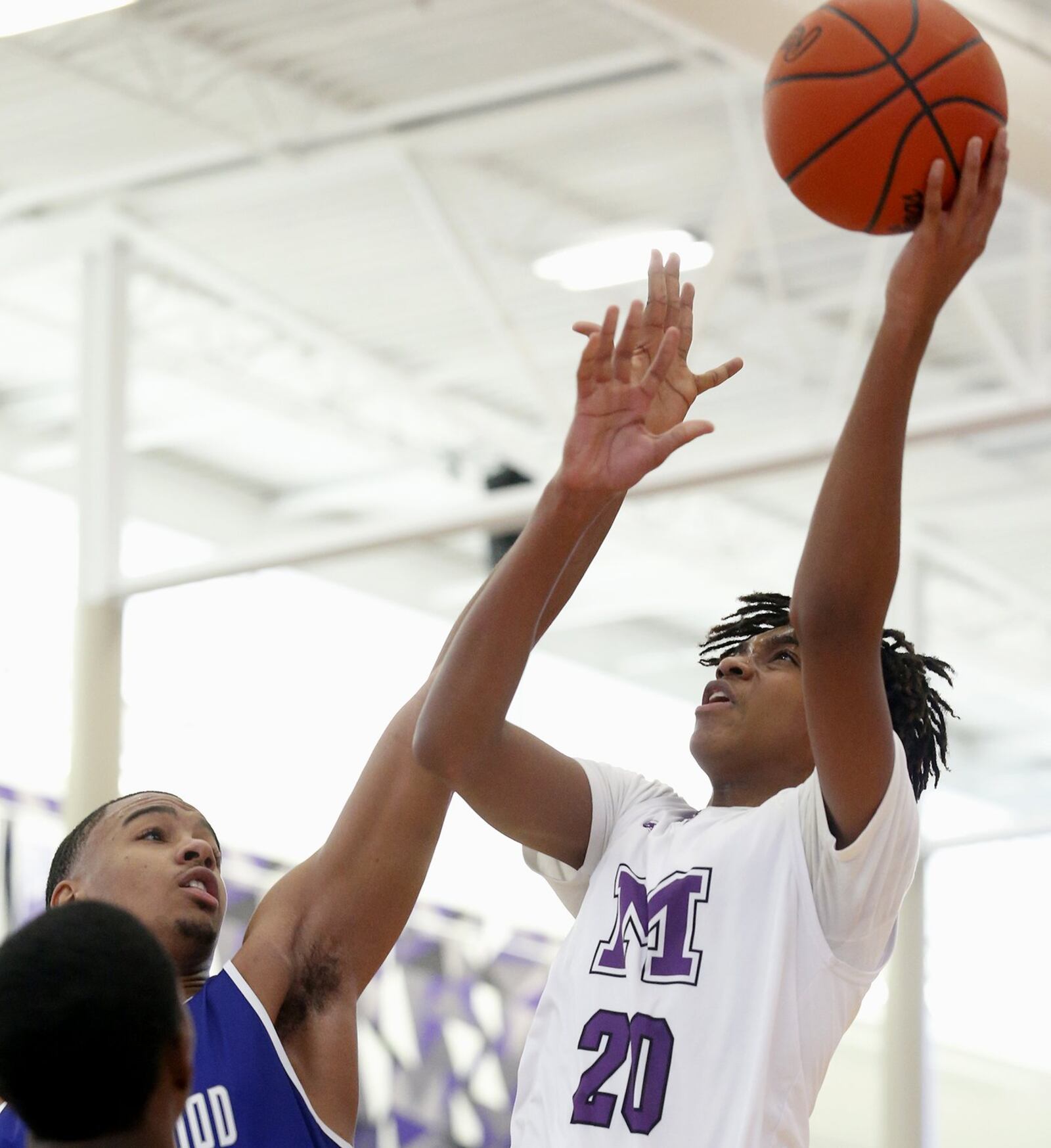 Middletown guard Johrdon Mumford eyes the basket Sunday against Crestwood Prep (Canada) during the inaugural Midwest King Classic at Wade E. Miller Arena in Middletown. Crestwood won 64-50. CONTRIBUTED PHOTO BY E.L. HUBBARD