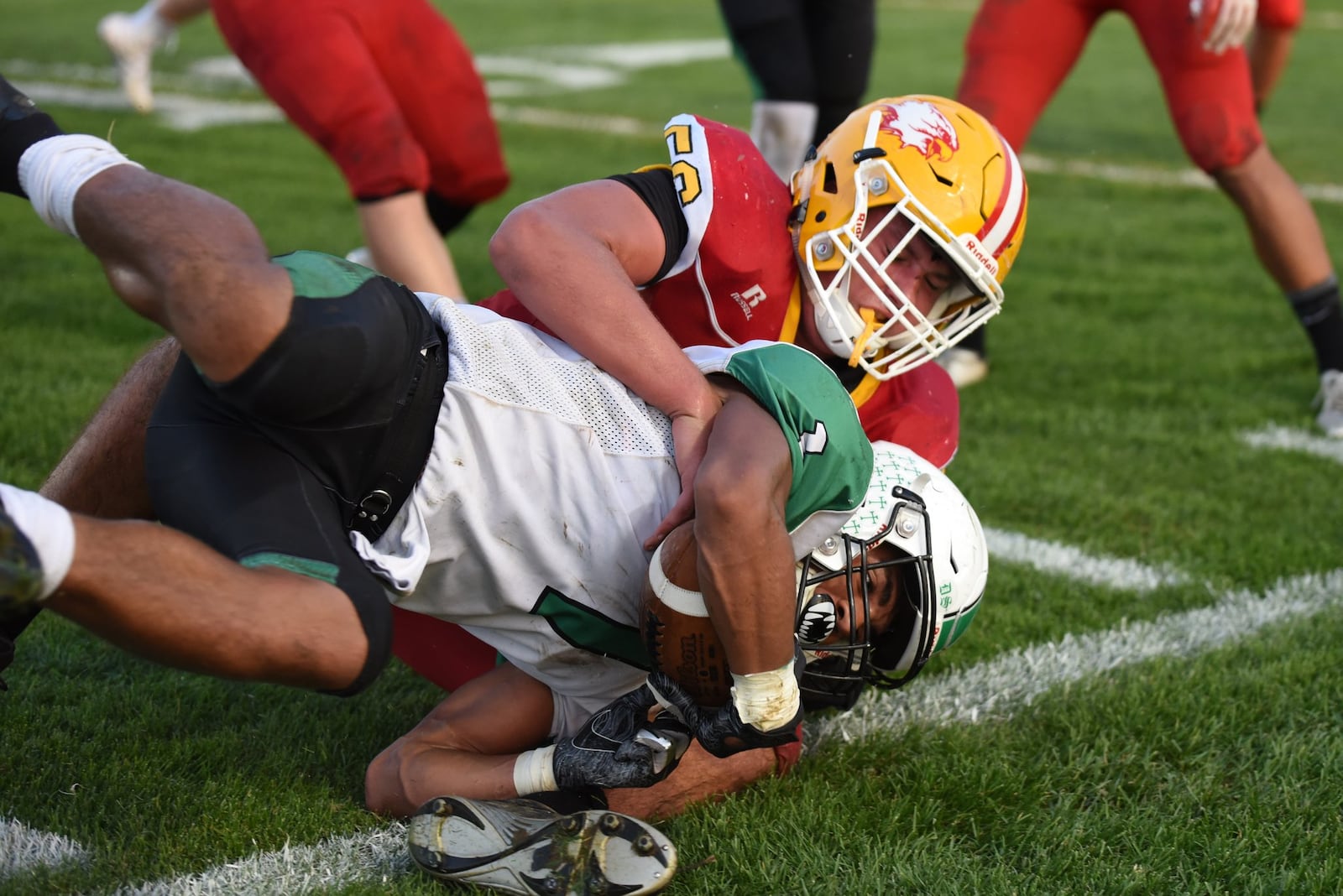 Fenwick’s Sam Secrest tackles Badin’s Davon Starks during a Sept. 14 game at Krusling Field in Middletown. Fenwick posted a 21-9 victory. CONTRIBUTED PHOTO BY ANGIE MOHRHAUS