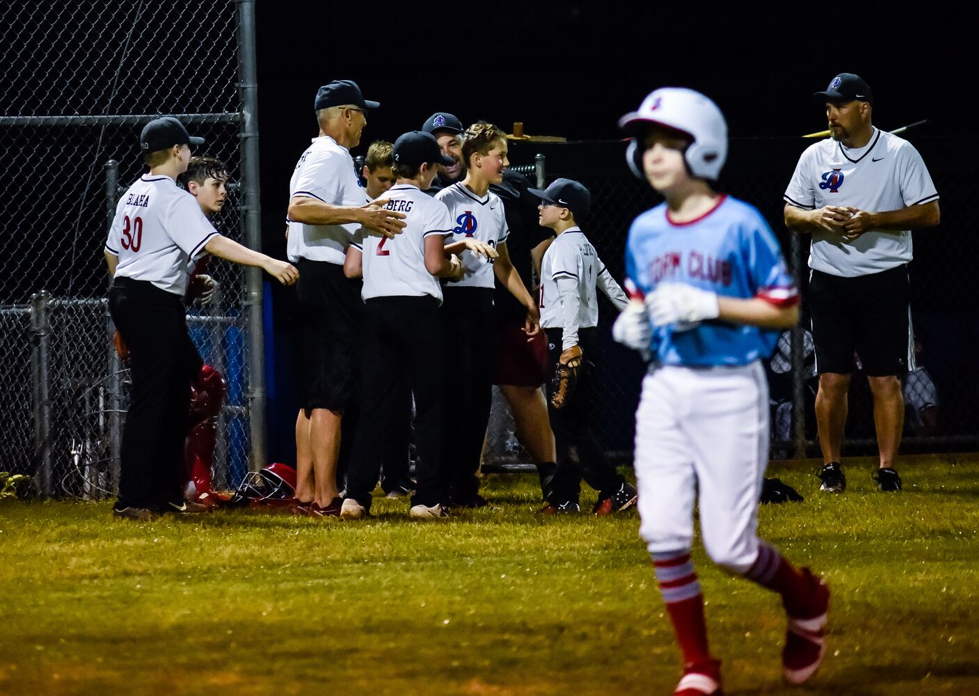 Youth baseball teams get back in action just after midnight