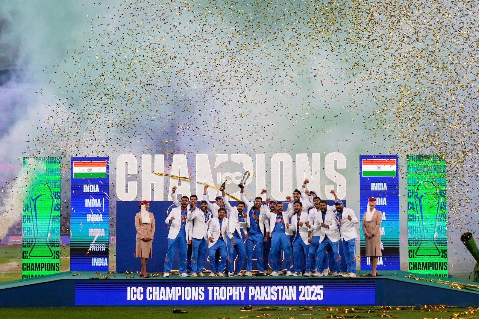 India's players celebrate after winning the ICC Champions Trophy final cricket match against New Zealand at Dubai International Cricket Stadium in Dubai, United Arab Emirates, Sunday, March 9, 2025. (AP Photo/Altaf Qadri)