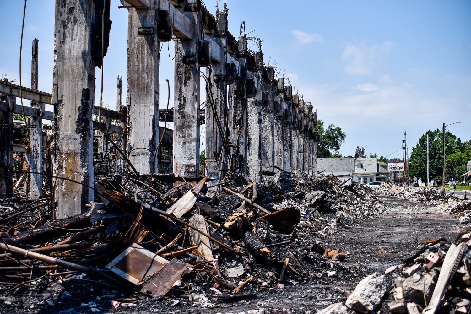 Crews demolish warehouse after massive fire in Hamilton