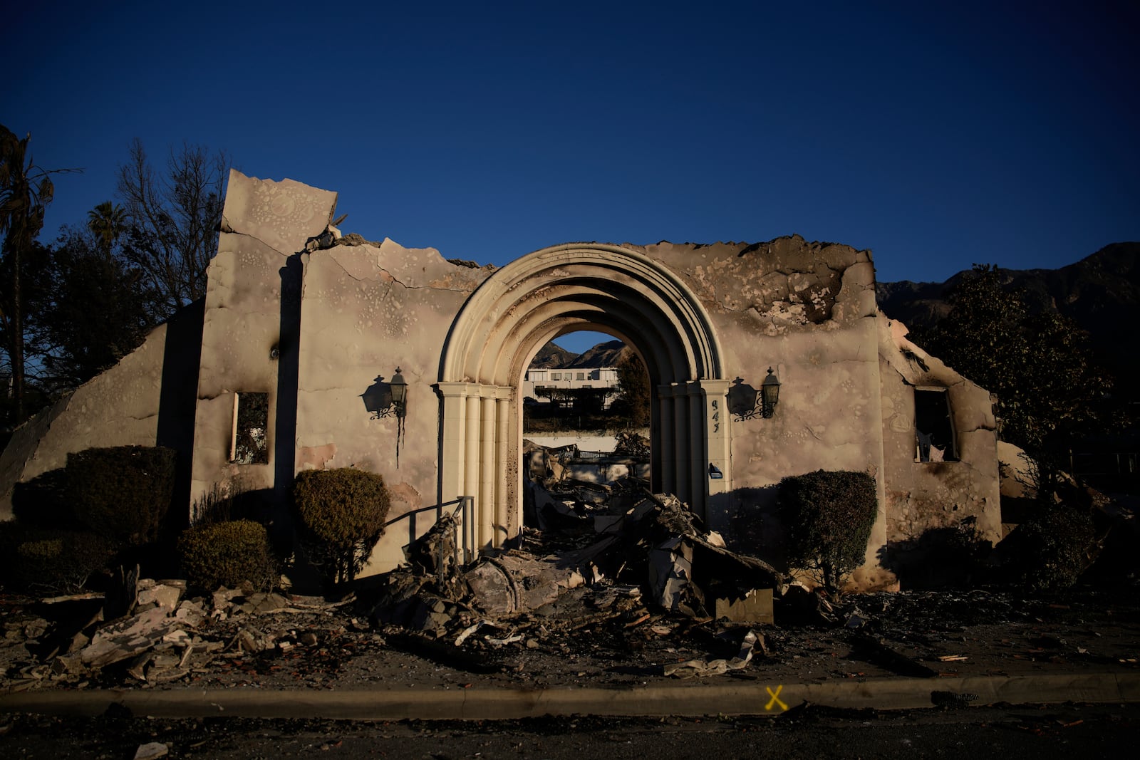 A church destroyed by the Eaton Fire in in Altadena, Calif., is seen Wednesday, Jan 15, 2025. (AP Photo/John Locher)