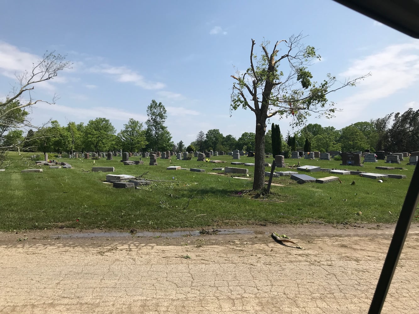 PHOTOS: Tornado-damaged communities dig out, clean up