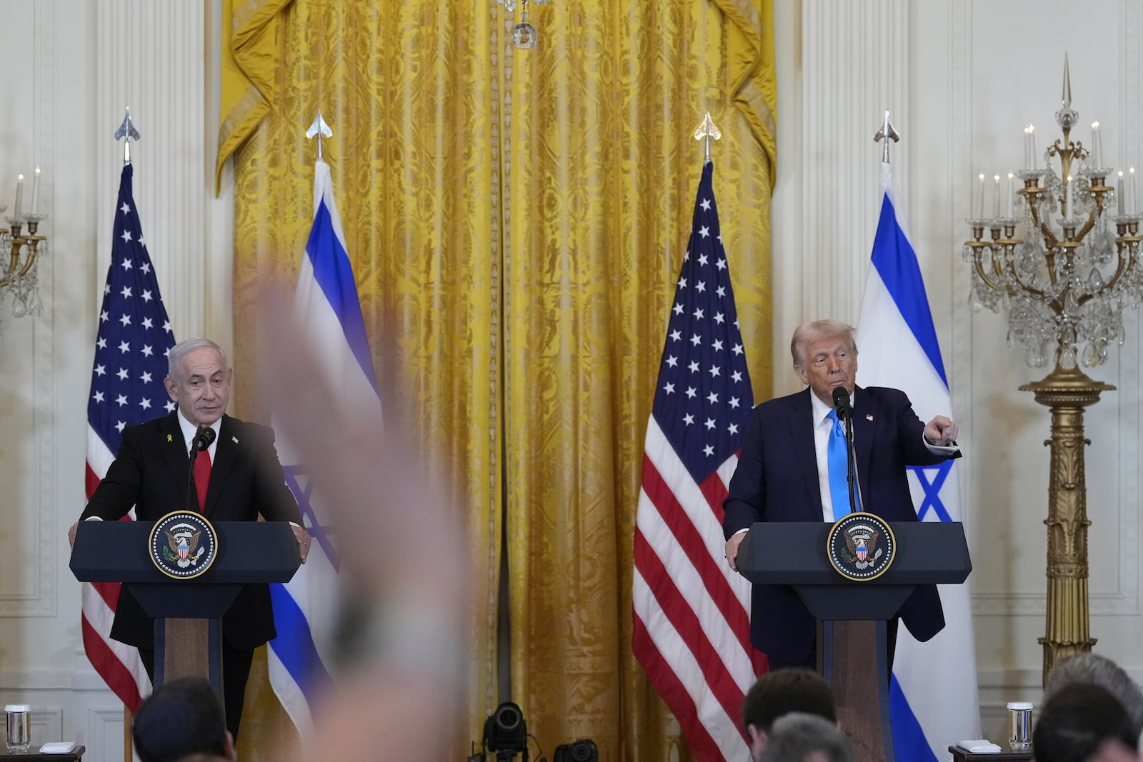 President Donald Trump and Israeli Prime Minister Benjamin Netanyahu take questions during a news conference in the East Room of the White House, Tuesday, Feb. 4, 2025, in Washington. (AP Photo/Alex Brandon)