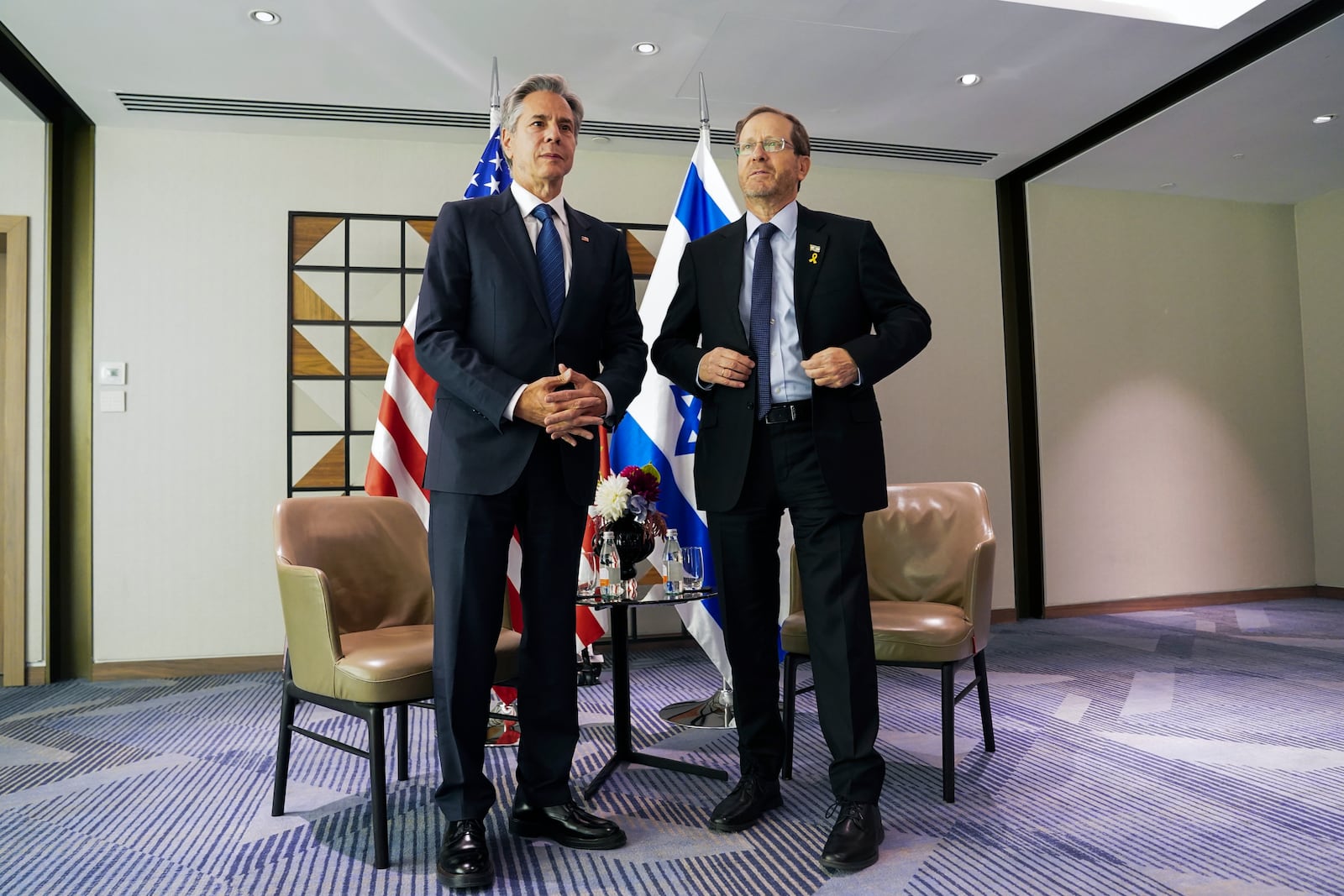 U.S. Secretary of State Antony Blinken, left, meets with Israel's President Isaac Herzog in Tel Aviv, Tuesday, Oct. 22, 2024. (Nathan Howard/Pool via AP)