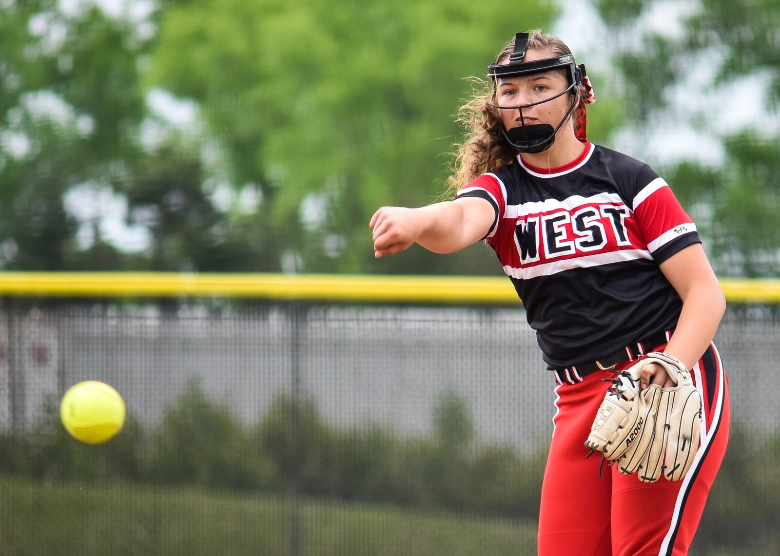 Lakota West freshman pitcher K.K. Mathis deals to the plate during Friday’s Division I district softball final against Fairfield at Lakota East. West won 8-2. NICK GRAHAM/STAFF