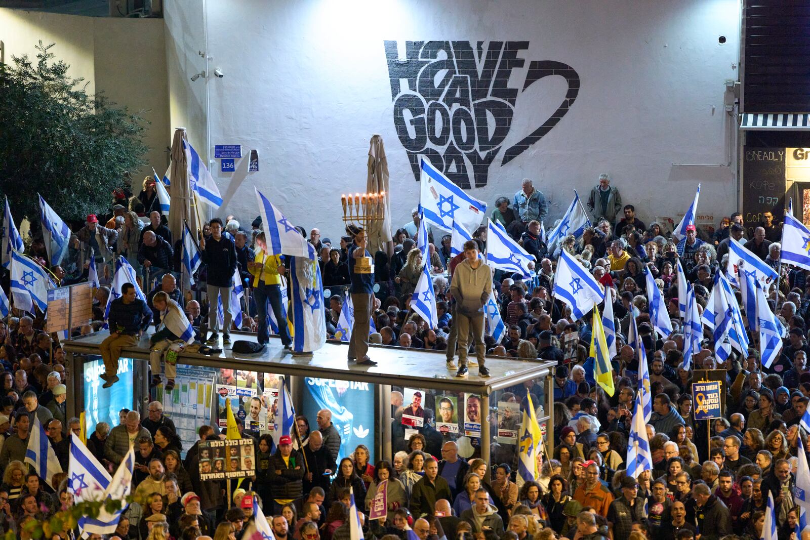 People take part in a protest demanding the immediate release of hostages held by Hamas in the Gaza Strip, in Tel Aviv, Israel, Saturday, March 22, 2025. (AP Photo/Ohad Zwigenberg)