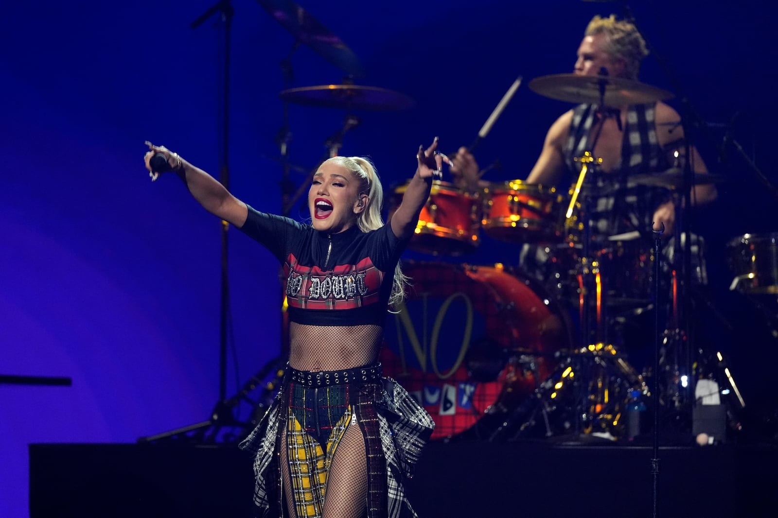 Gwen Stefani, left, and Adrian Young of No Doubt perform during the FireAid benefit concert on Thursday, Jan. 30, 2025, at The Forum in Inglewood, Calif. (AP Photo/Chris Pizzello)