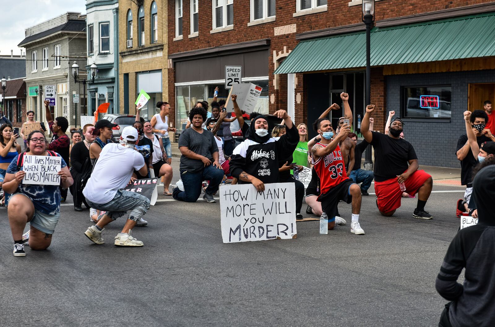 Over 75 people gathered at the city building for two different marches through downtown Middletown Wednesday, June 3, 2020. The groups gathered in response to the death of George Floyd in police custody in Minnesota. The crowd walked in the middle of Central Avenue on the way back to the city building while police blocked traffic. NICK GRAHAM / STAFF