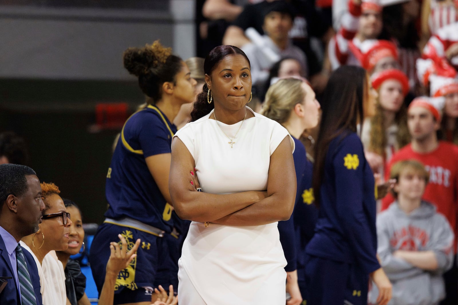 Notre Dame head coach Niele Ivey, center, looks on during the second half of an NCAA college basketball game against North Carolina State in Raleigh, N.C., Sunday, Feb. 23, 2025. (AP Photo/Ben McKeown)