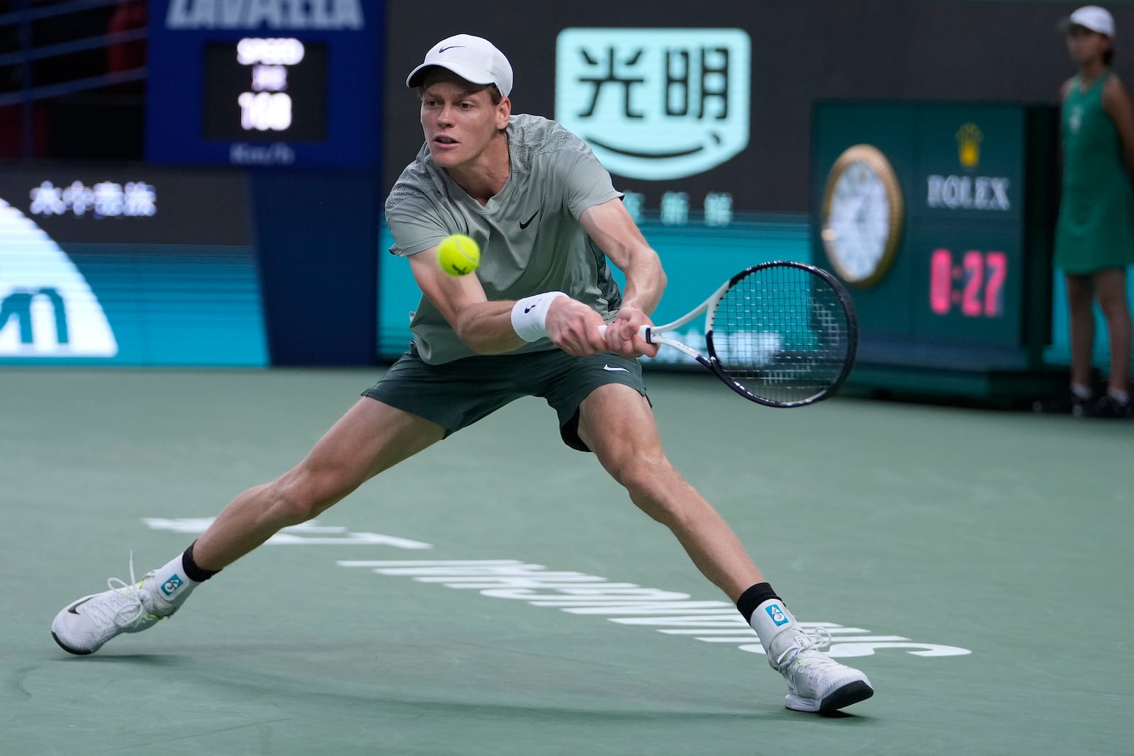 Jannik Sinner of Italy plays a backhand return against Machac of the Czech Republic during the men's singles semifinals match in the Shanghai Masters tennis tournament at Qizhong Forest Sports City Tennis Center in Shanghai, China, Saturday, Oct. 12, 2024. (AP Photo/Andy Wong)