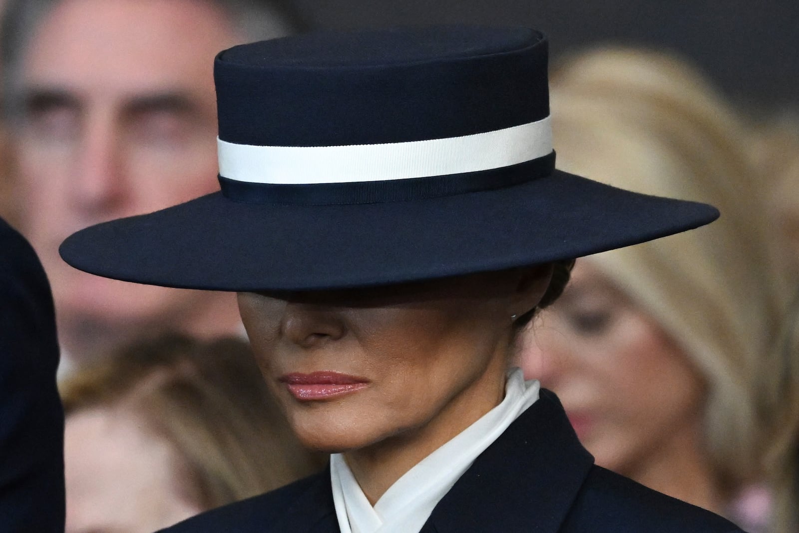 First lady Melania Trump stands for a benediction during the 60th Presidential Inauguration in the Rotunda of the U.S. Capitol in Washington, Monday, Jan. 20, 2025. (Saul Loeb/Pool photo via AP)