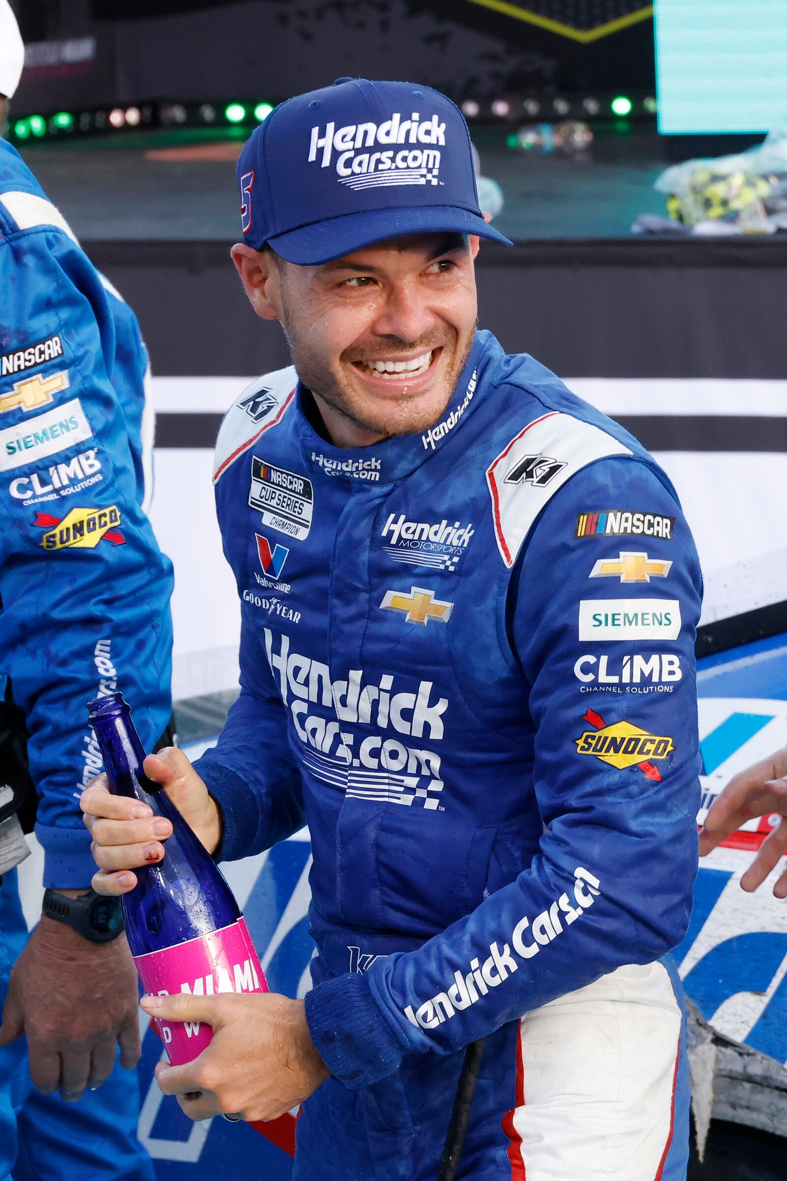 Kyle Larson celebrates in Victory Lane after winning a NASCAR Cup Series auto race at Homestead-Miami Speedway in Homestead, Fla., Sunday, March 23, 2025. (AP Photo/Terry Renna)